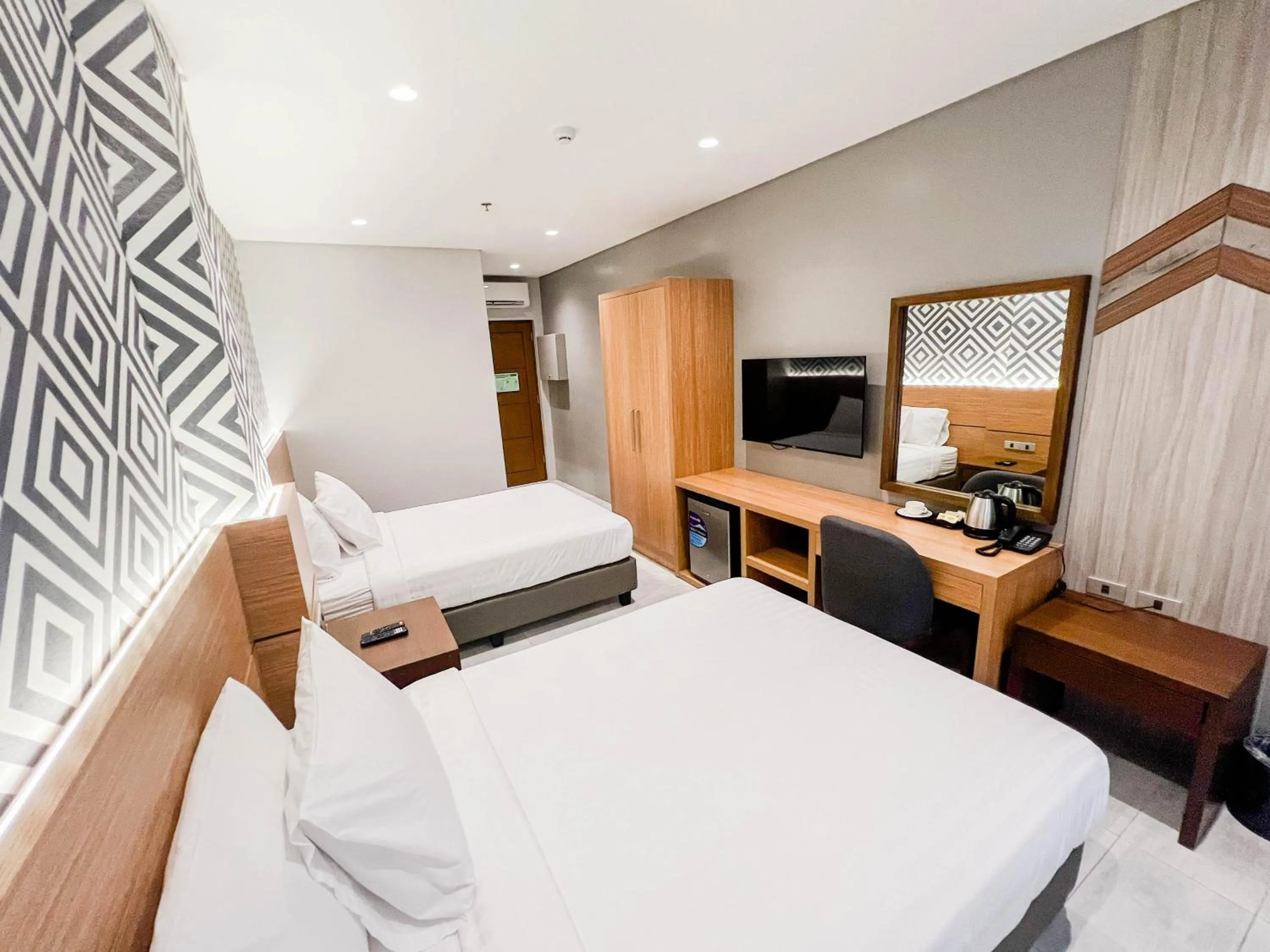 Photo of the whole room, Bed in The Manaoag Hotel