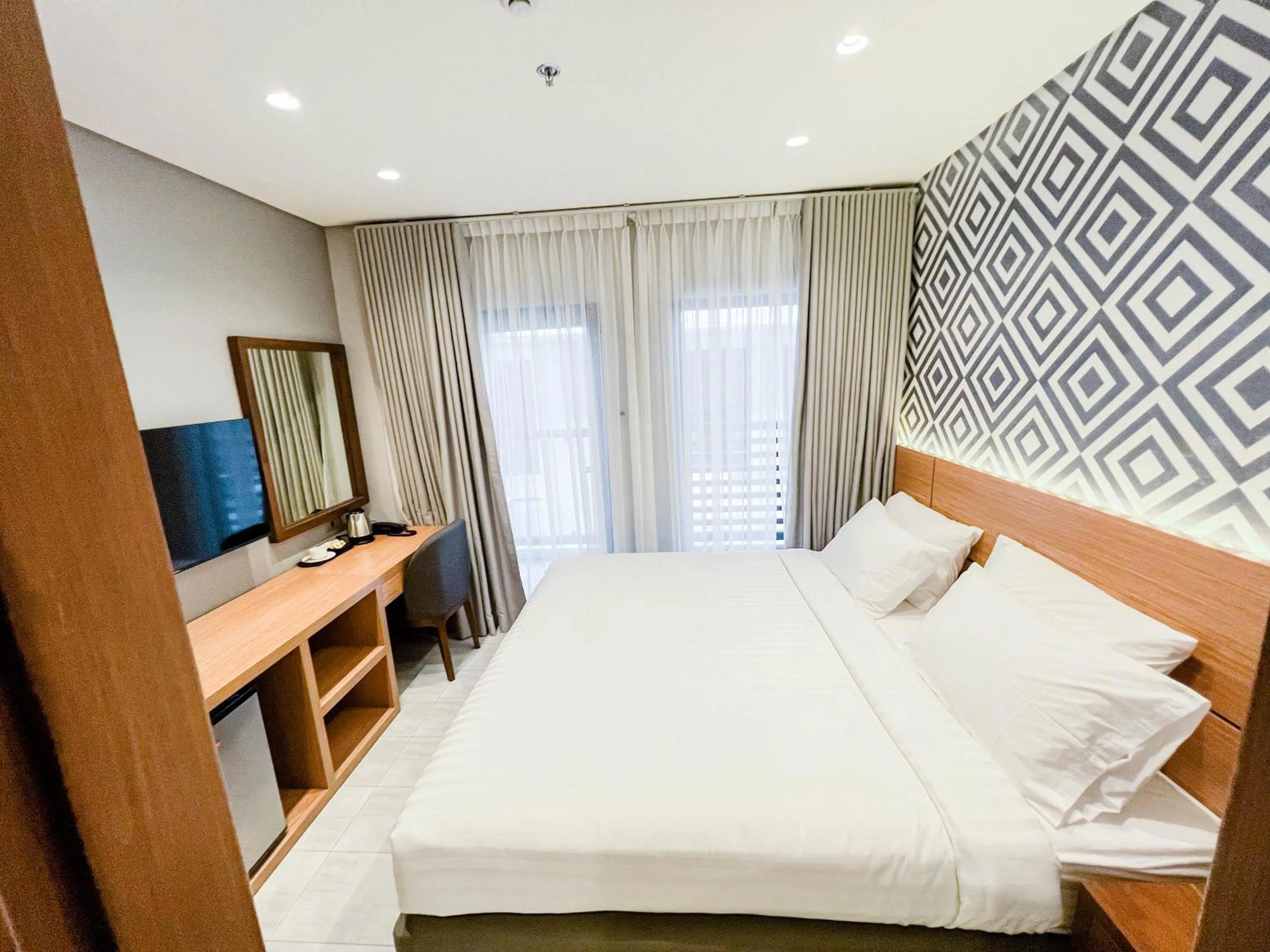 Photo of the whole room, Bed in The Manaoag Hotel