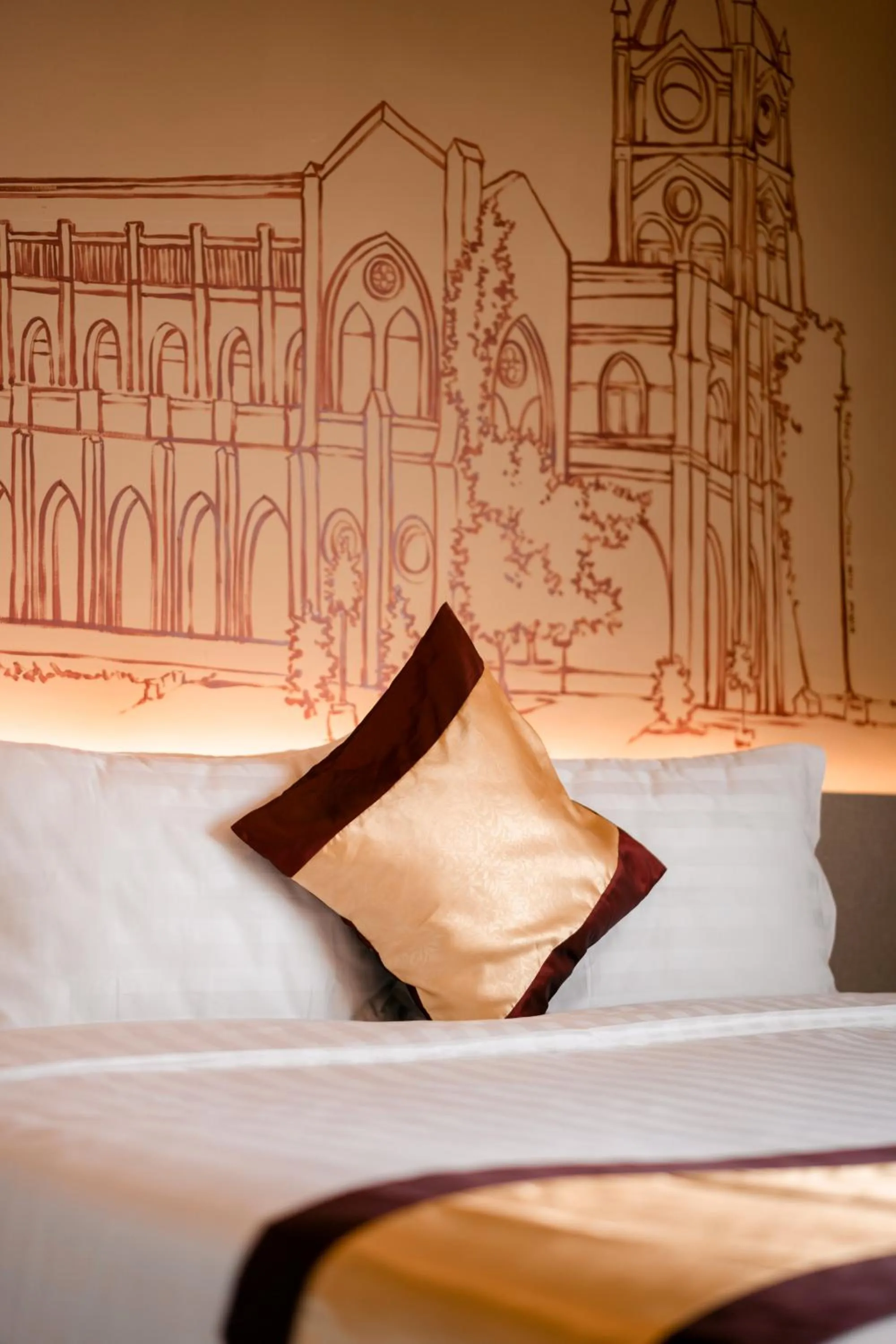 Bed in The Rangoon Hotel