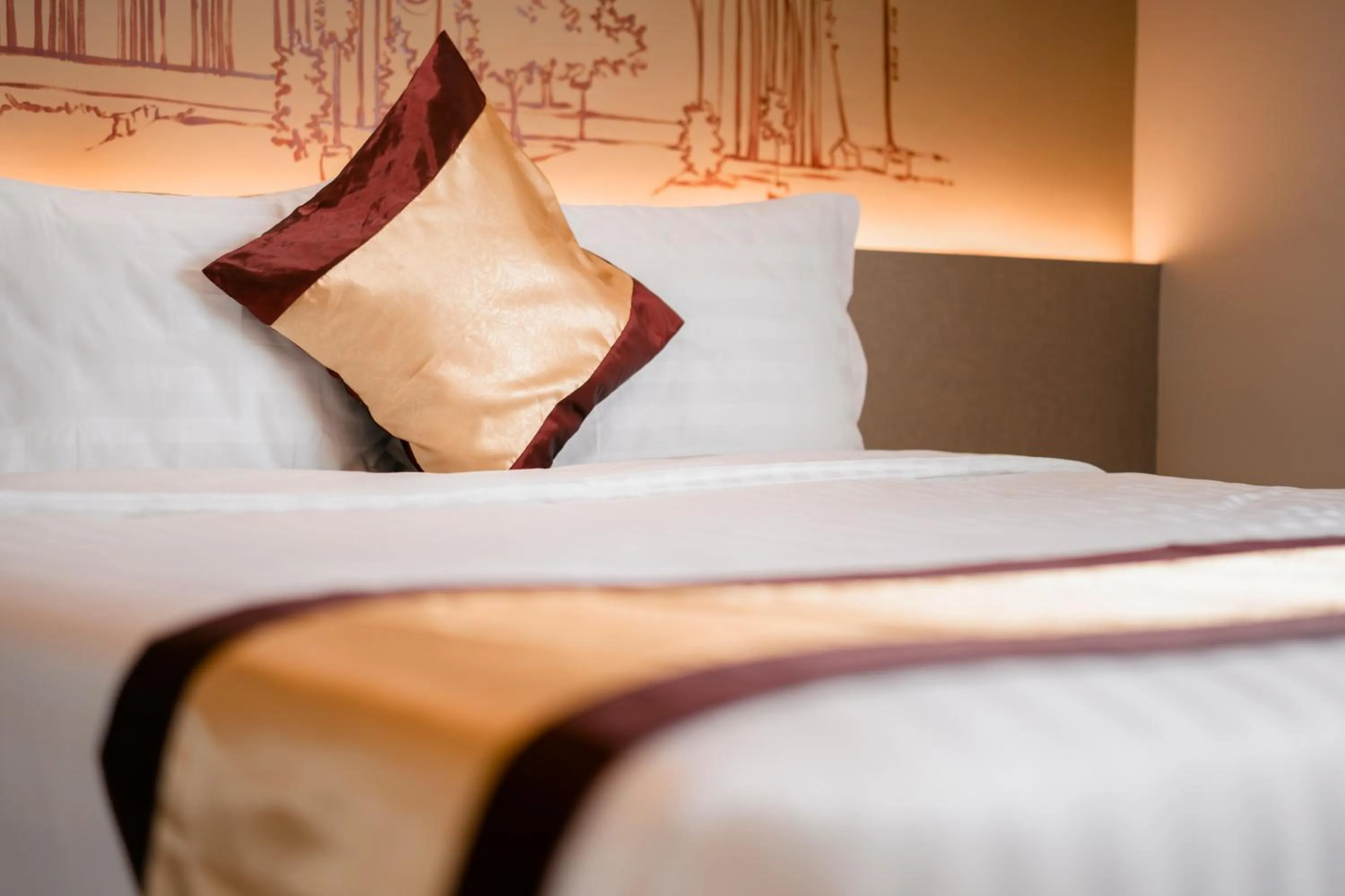 Bed in The Rangoon Hotel