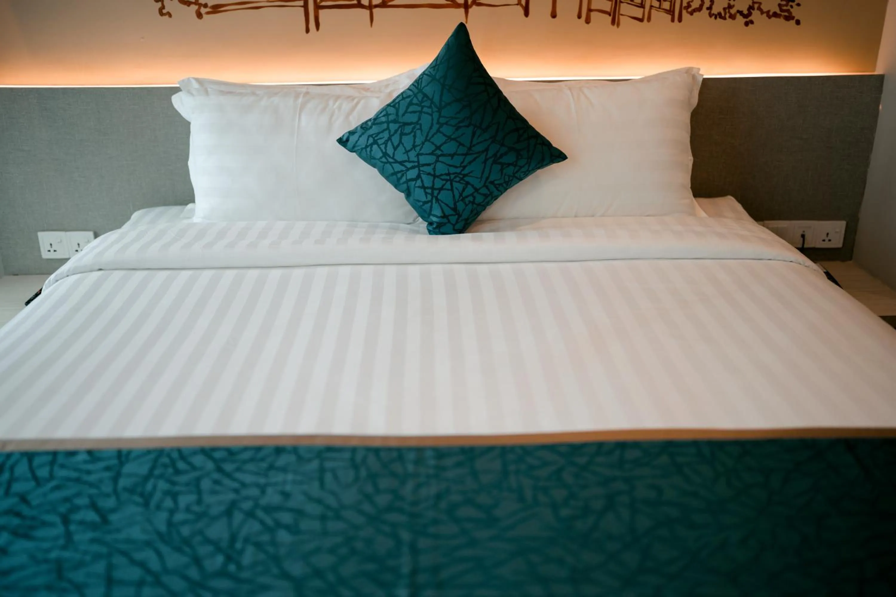 Bed in The Rangoon Hotel