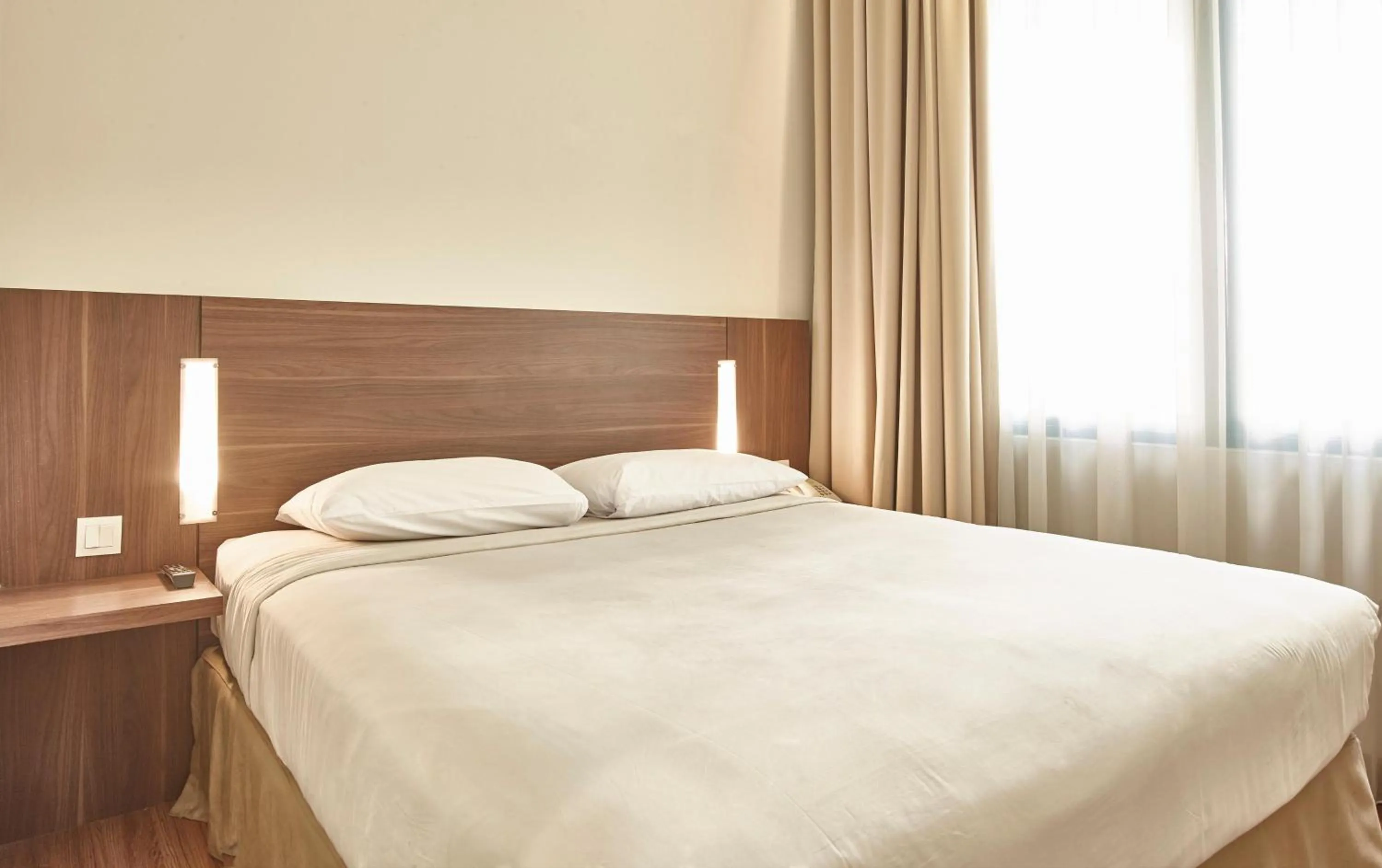 Bedroom, Bed in Grand Cikarang Hotel