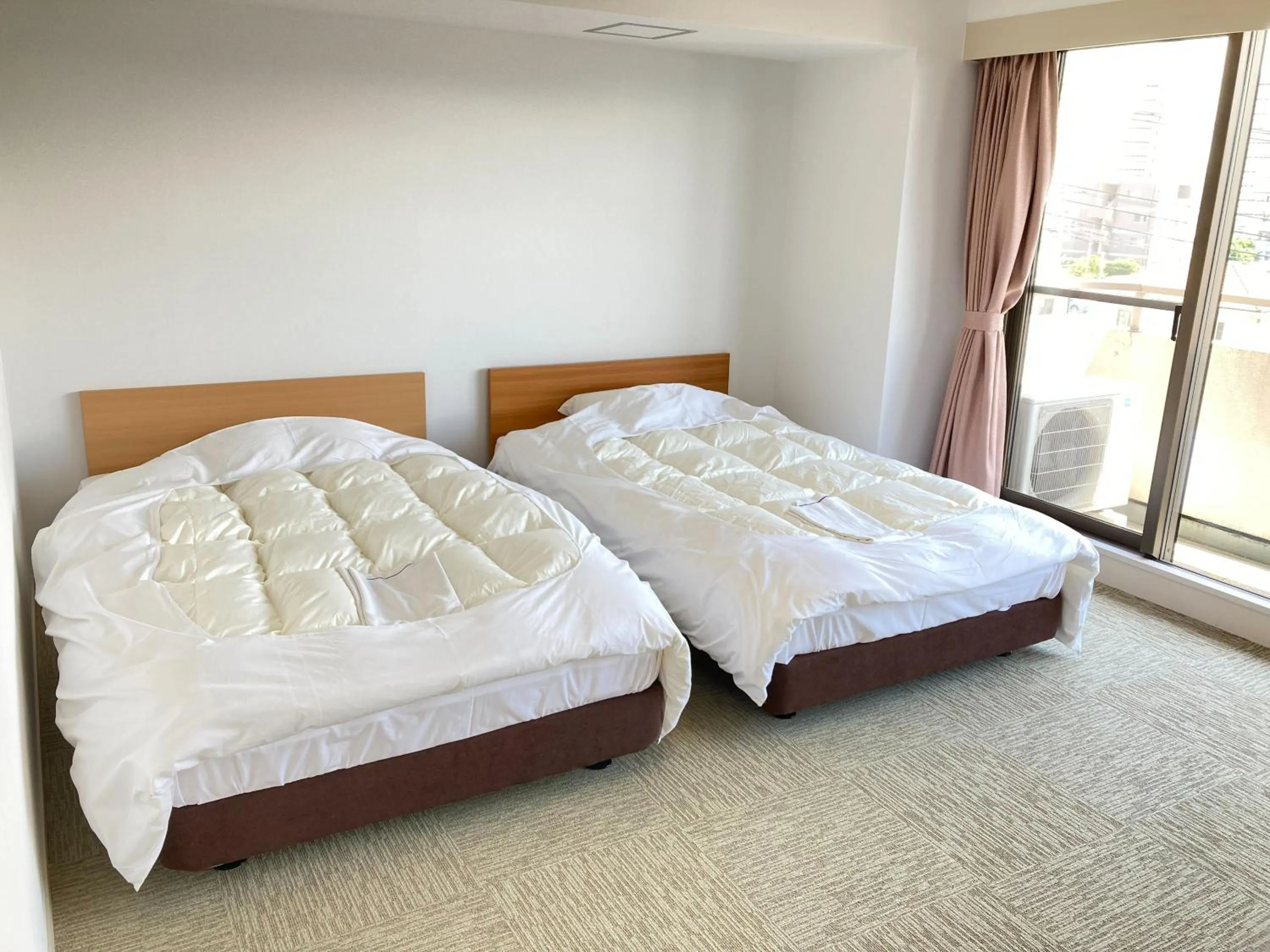 Bed in Chateraise Lodge Kasugai