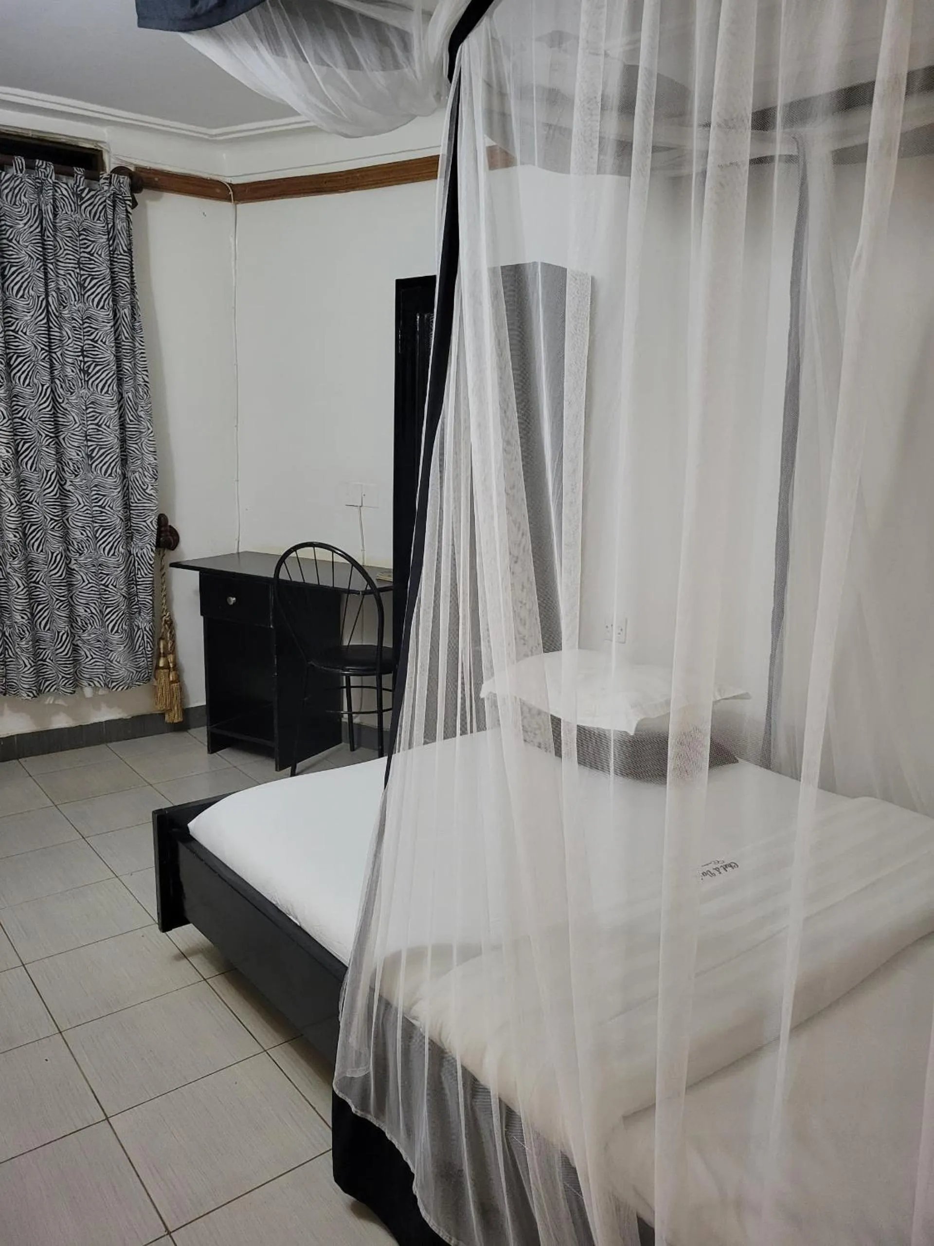 Bed in Chel and Vade Cottages