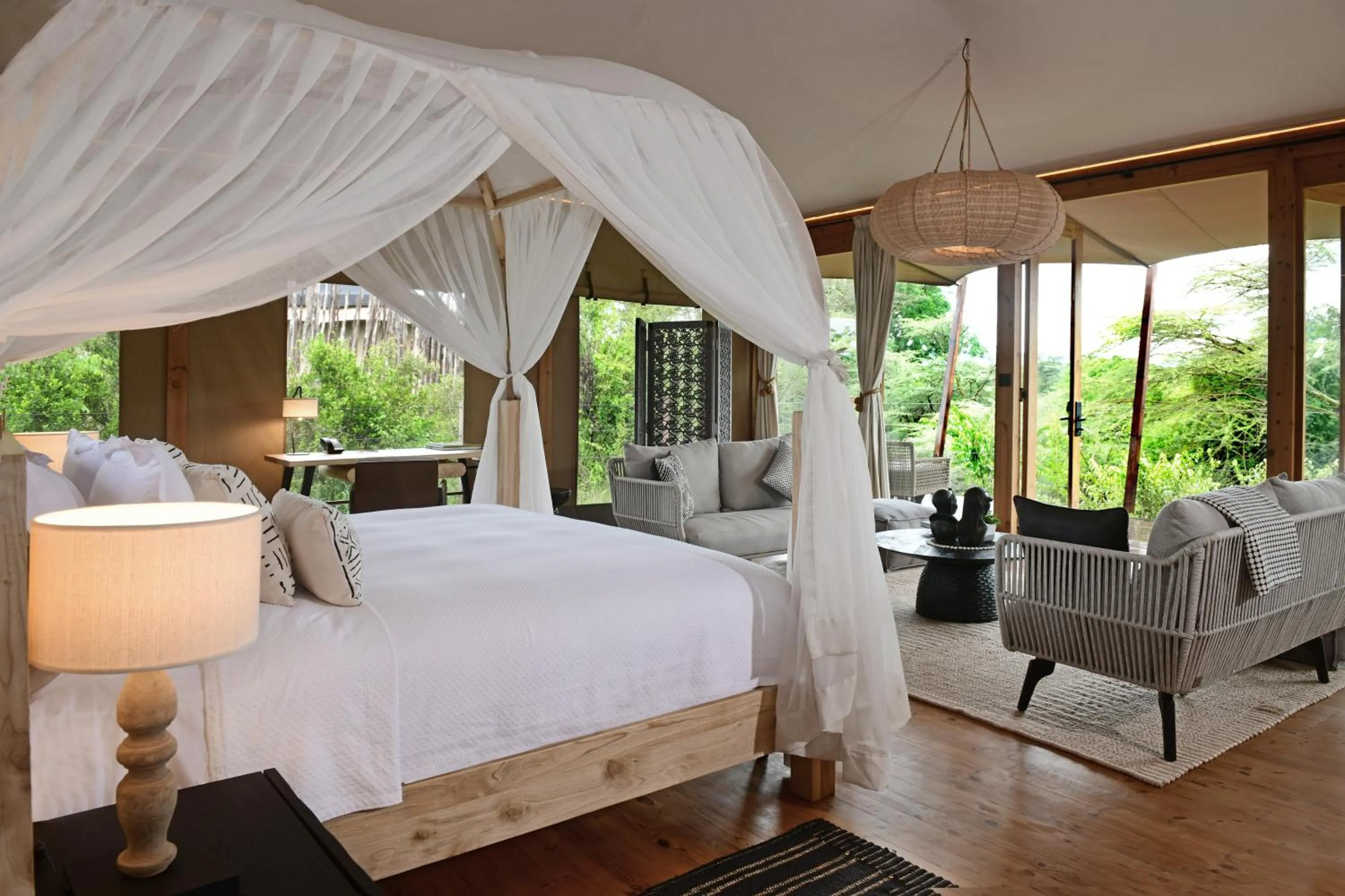 Photo of the whole room, Bed in JW Marriott Masai Mara Lodge