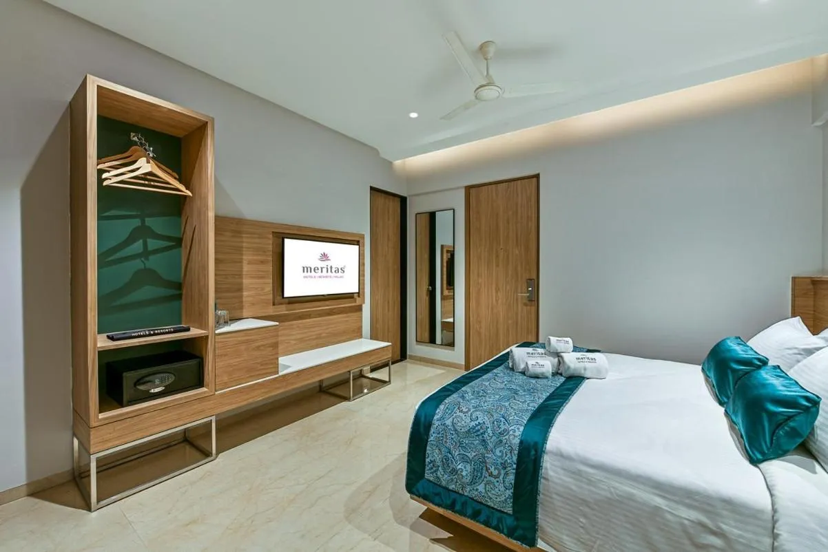 Bed in Meritas Aura Resort