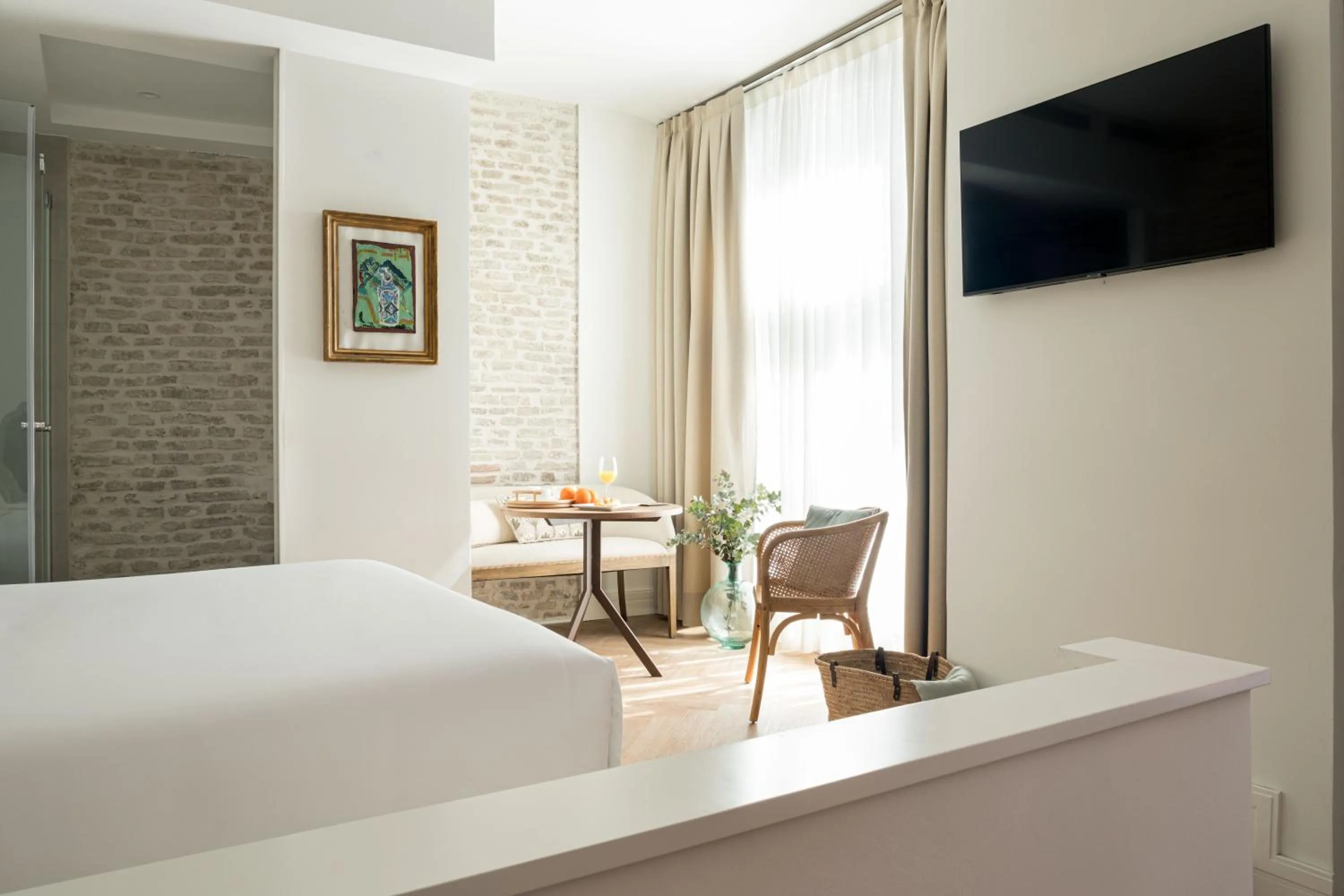 Bed in Mylu Suites by Puerta Catedral
