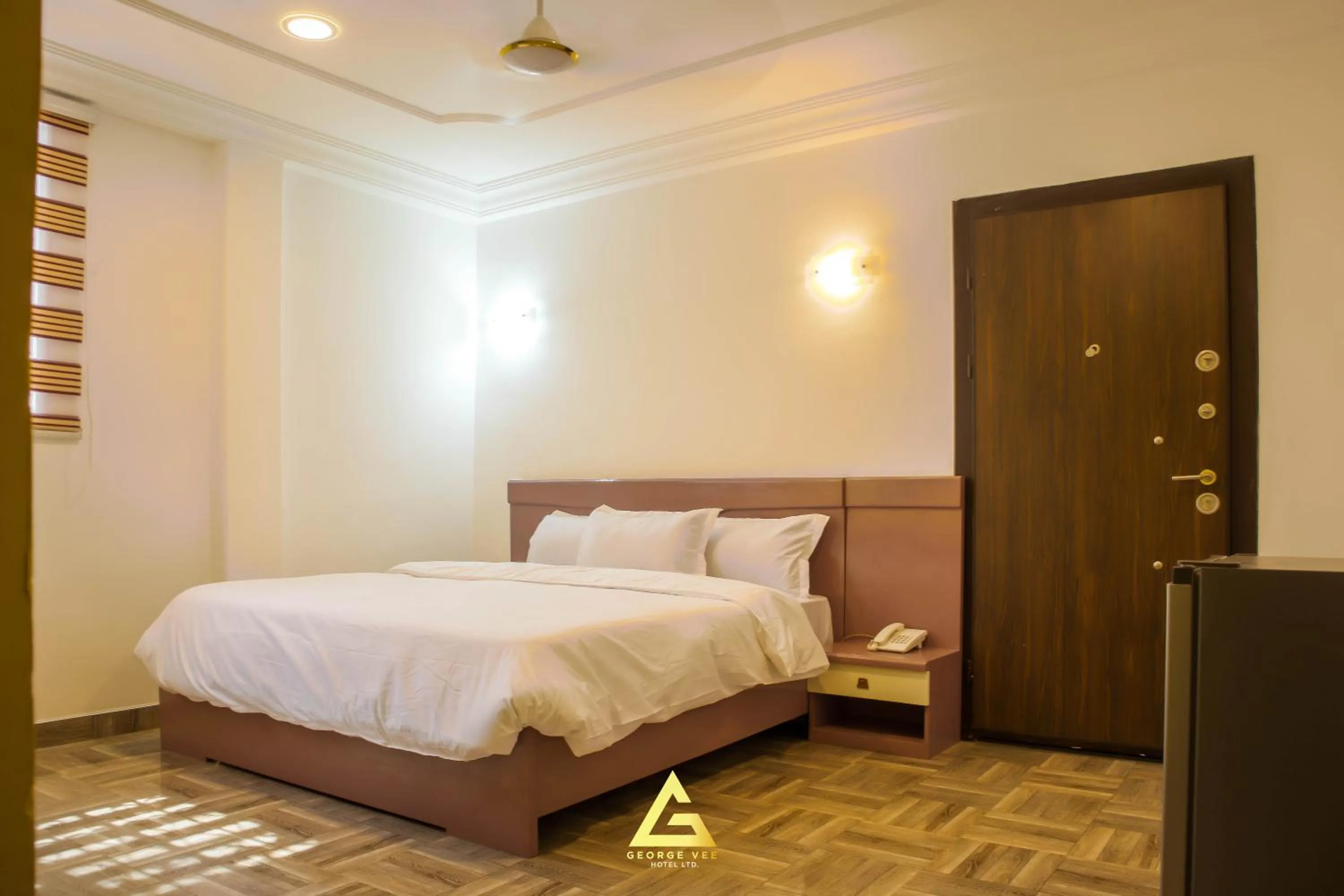 Bed in GEORGE VEE HOTEL LTD