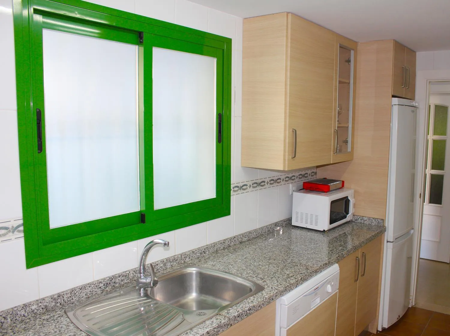 Kitchen or kitchenette in Hotel Apartamentos Manilva Sun