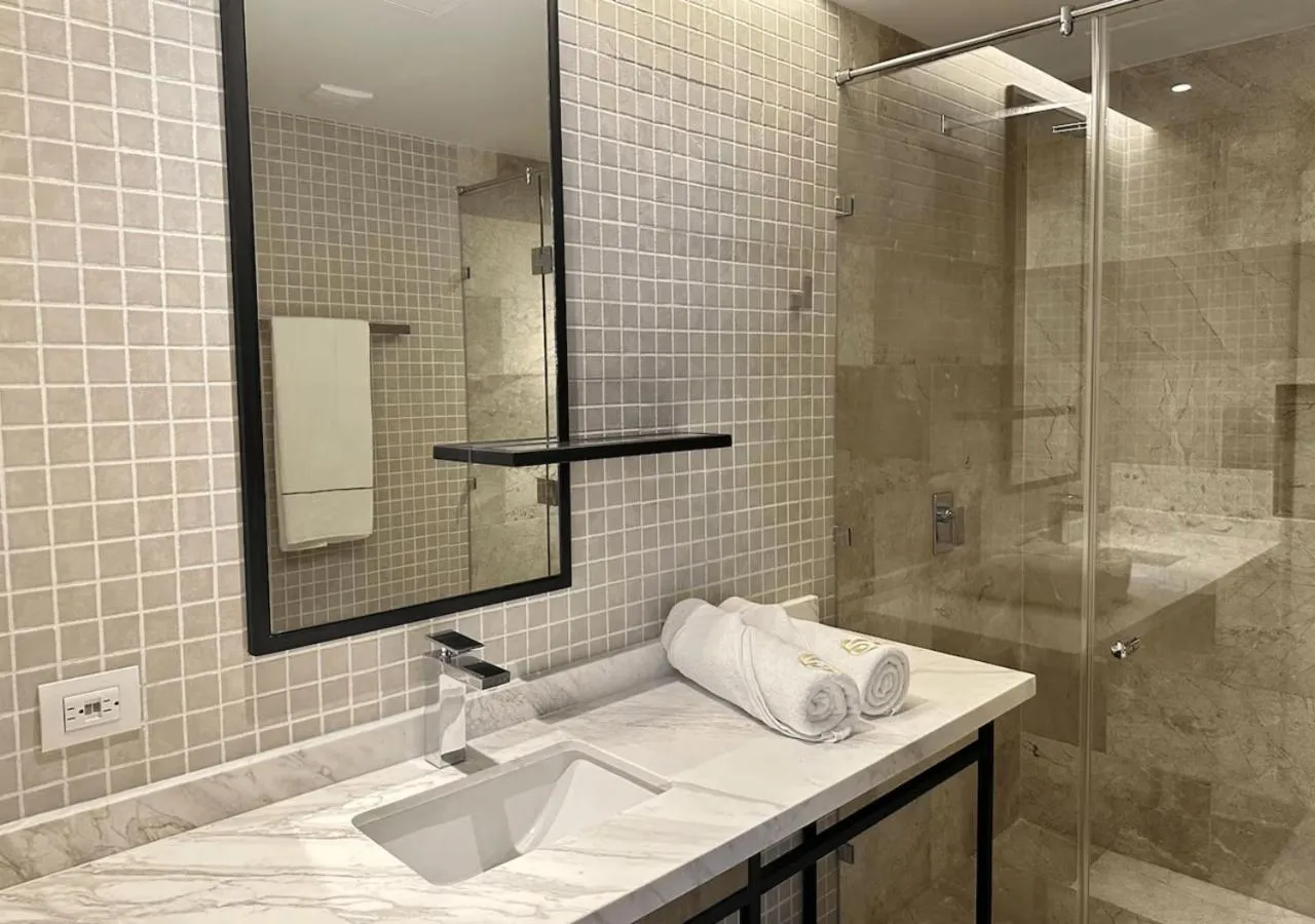 Bathroom in Luxury 1BR Condo Prime Location