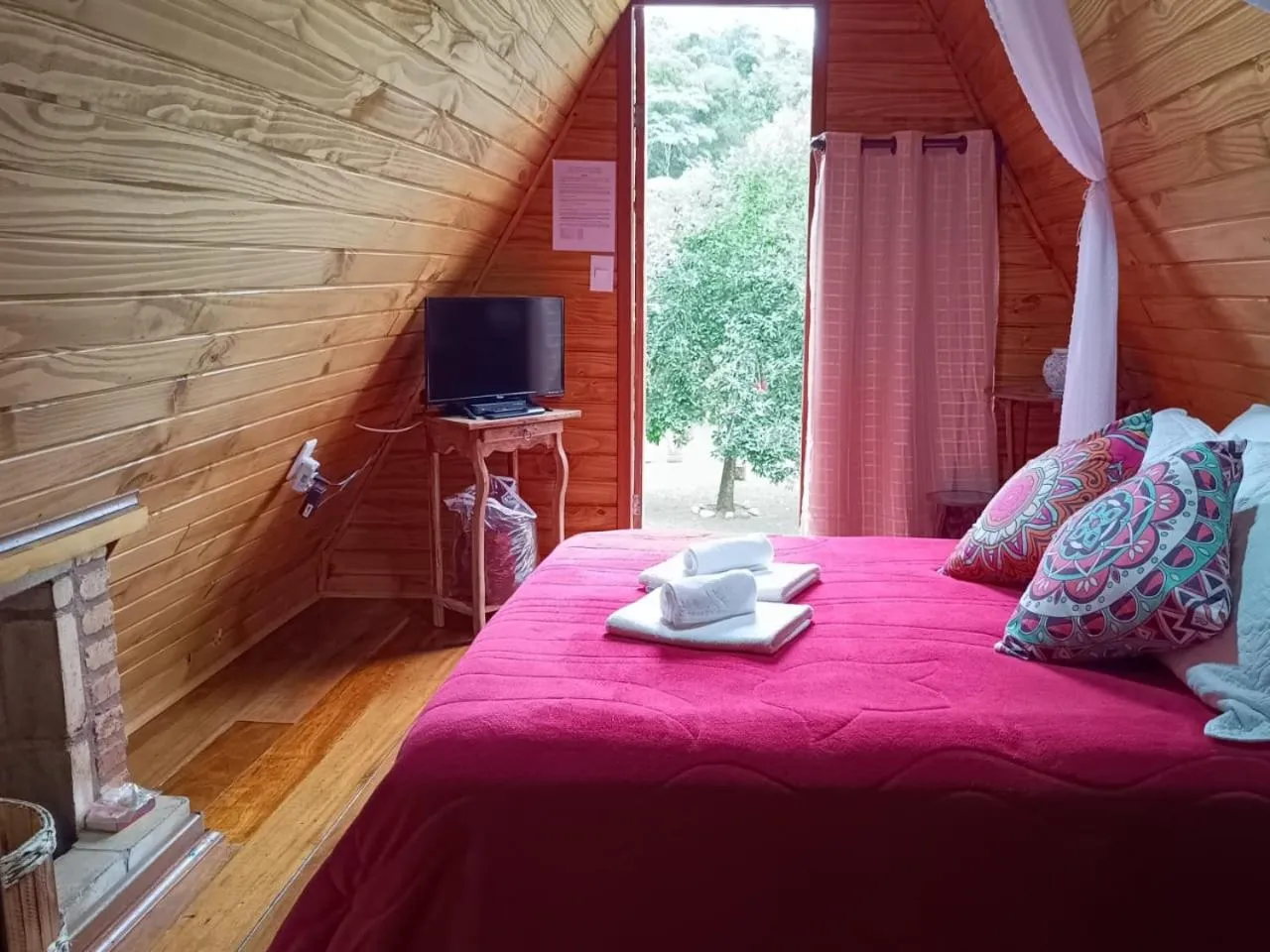 Bed in Pousada Bosque do Visconde