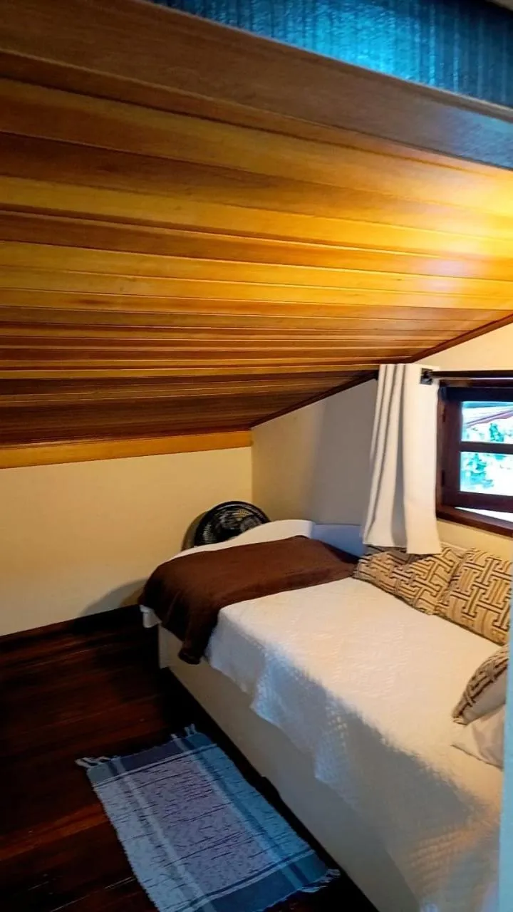 Bed in Pousada Bosque do Visconde