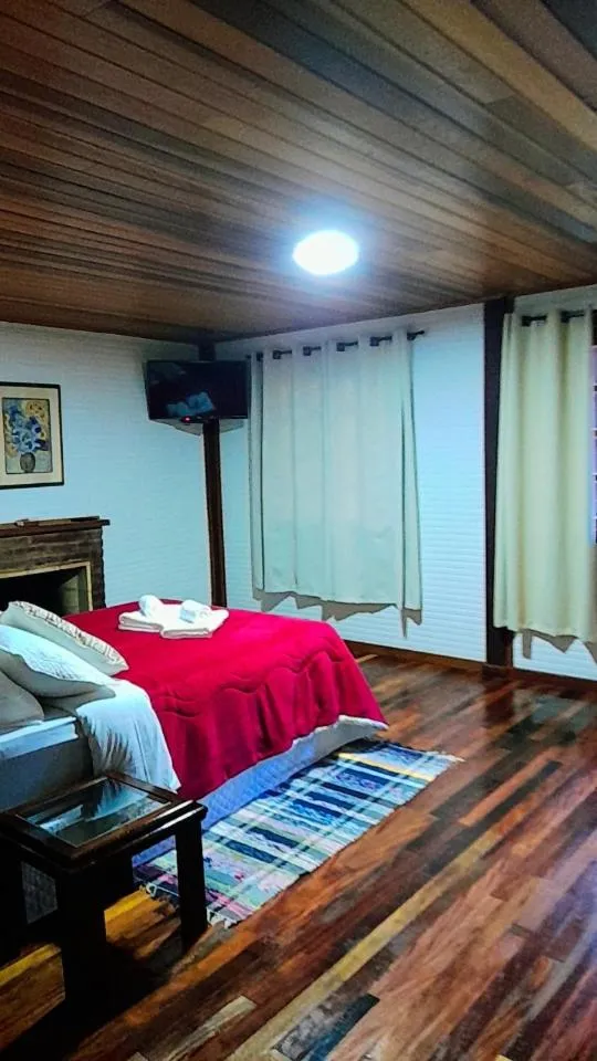 Bed in Pousada Bosque do Visconde