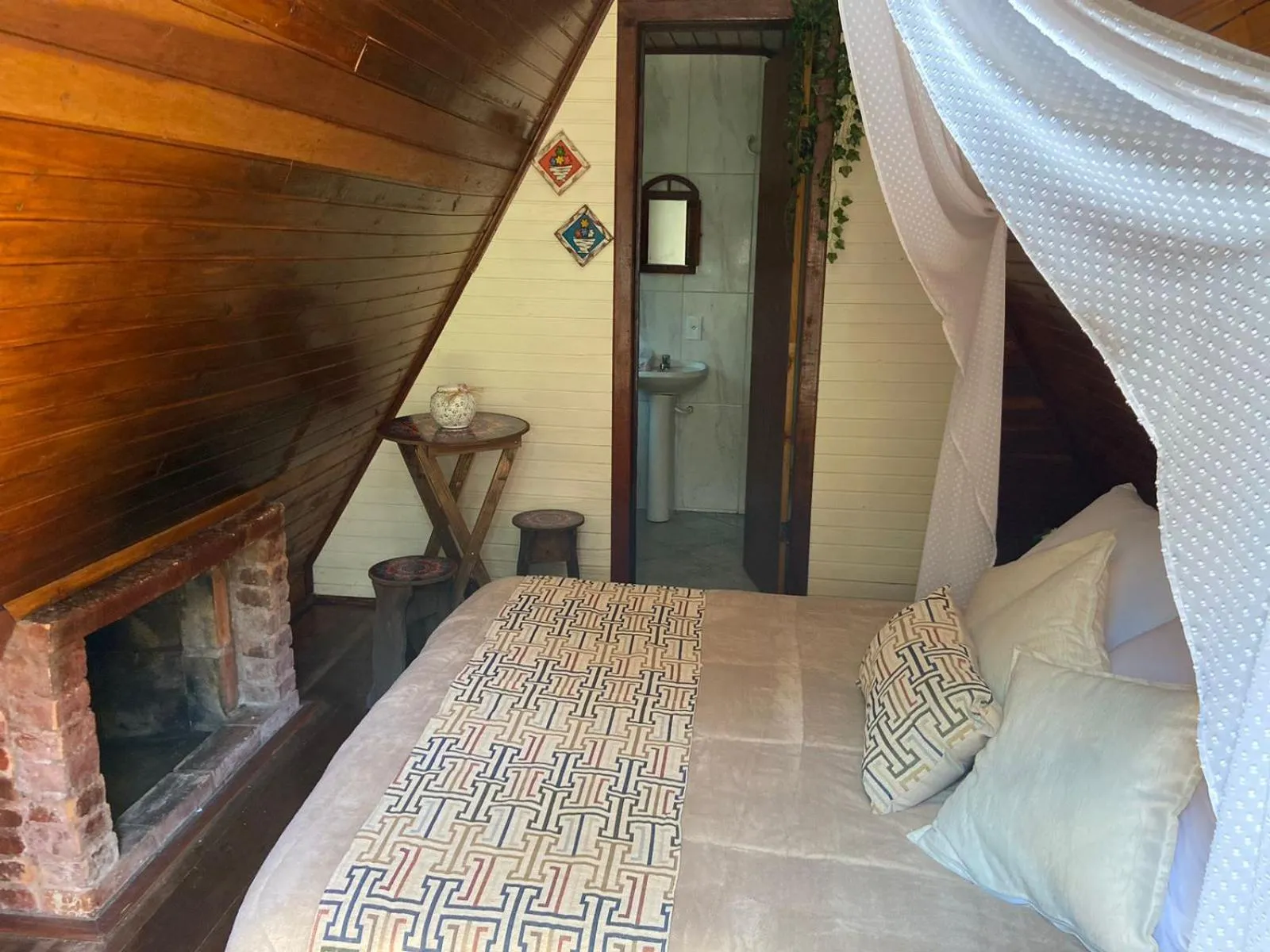 Bed in Pousada Bosque do Visconde