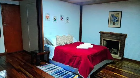 Bed in Pousada Bosque do Visconde