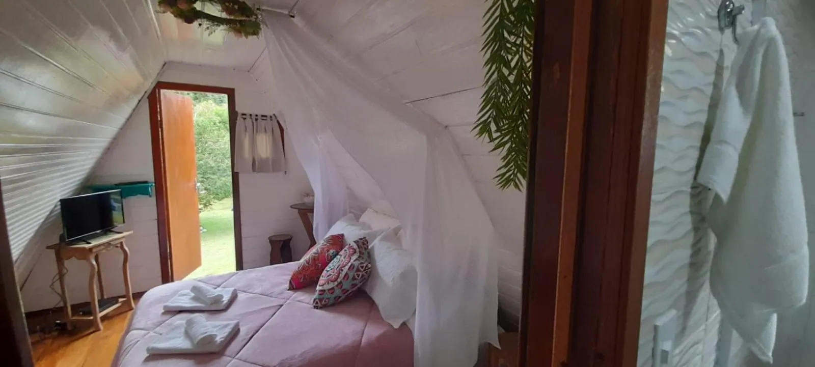 Bed in Pousada Bosque do Visconde