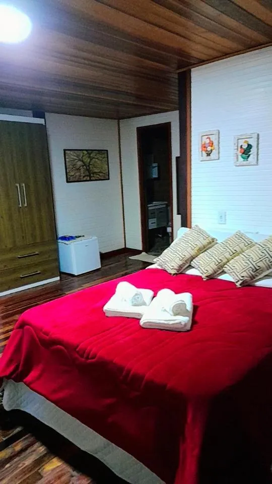 Bed in Pousada Bosque do Visconde