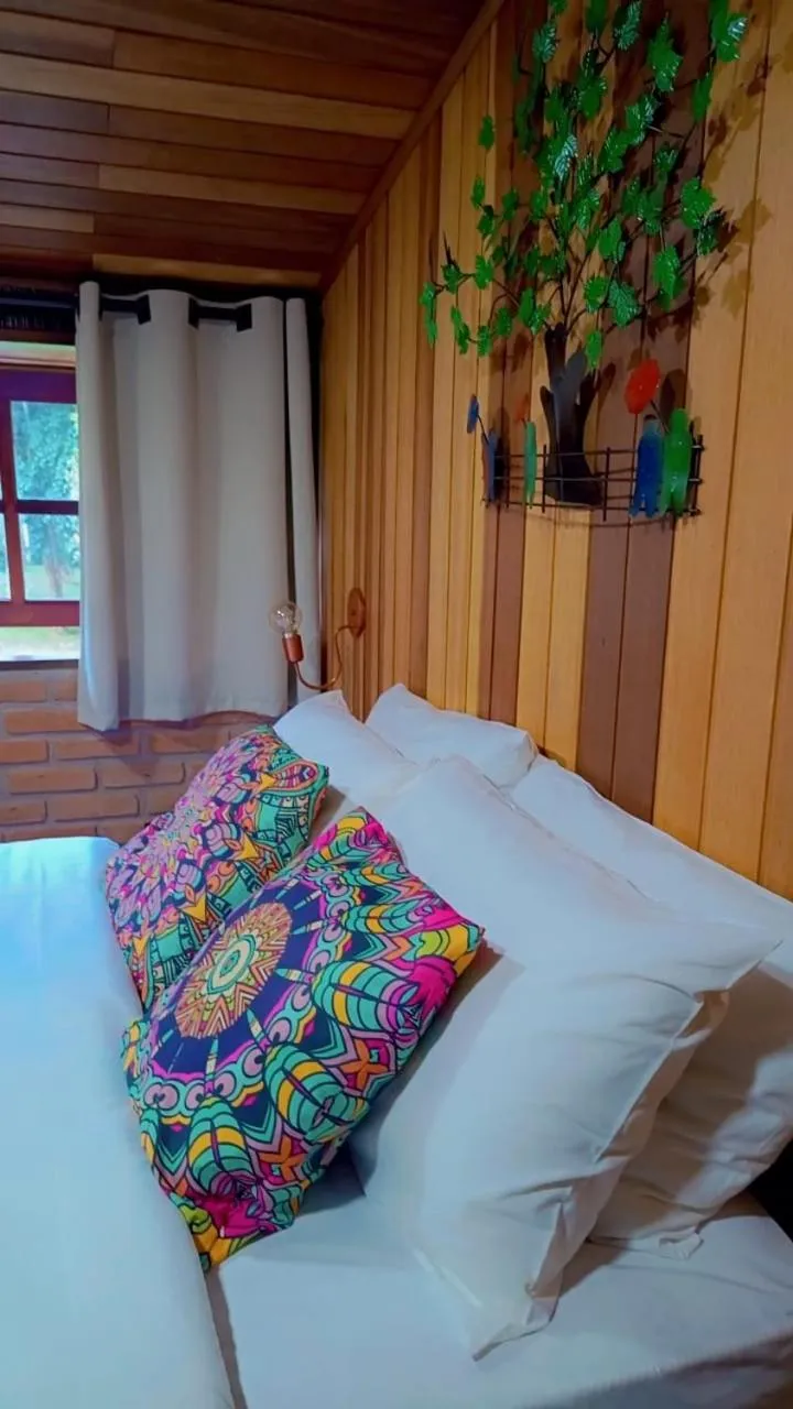 Bed in Pousada Bosque do Visconde