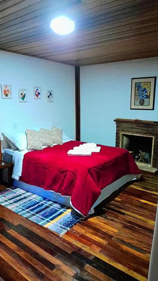 Bed in Pousada Bosque do Visconde