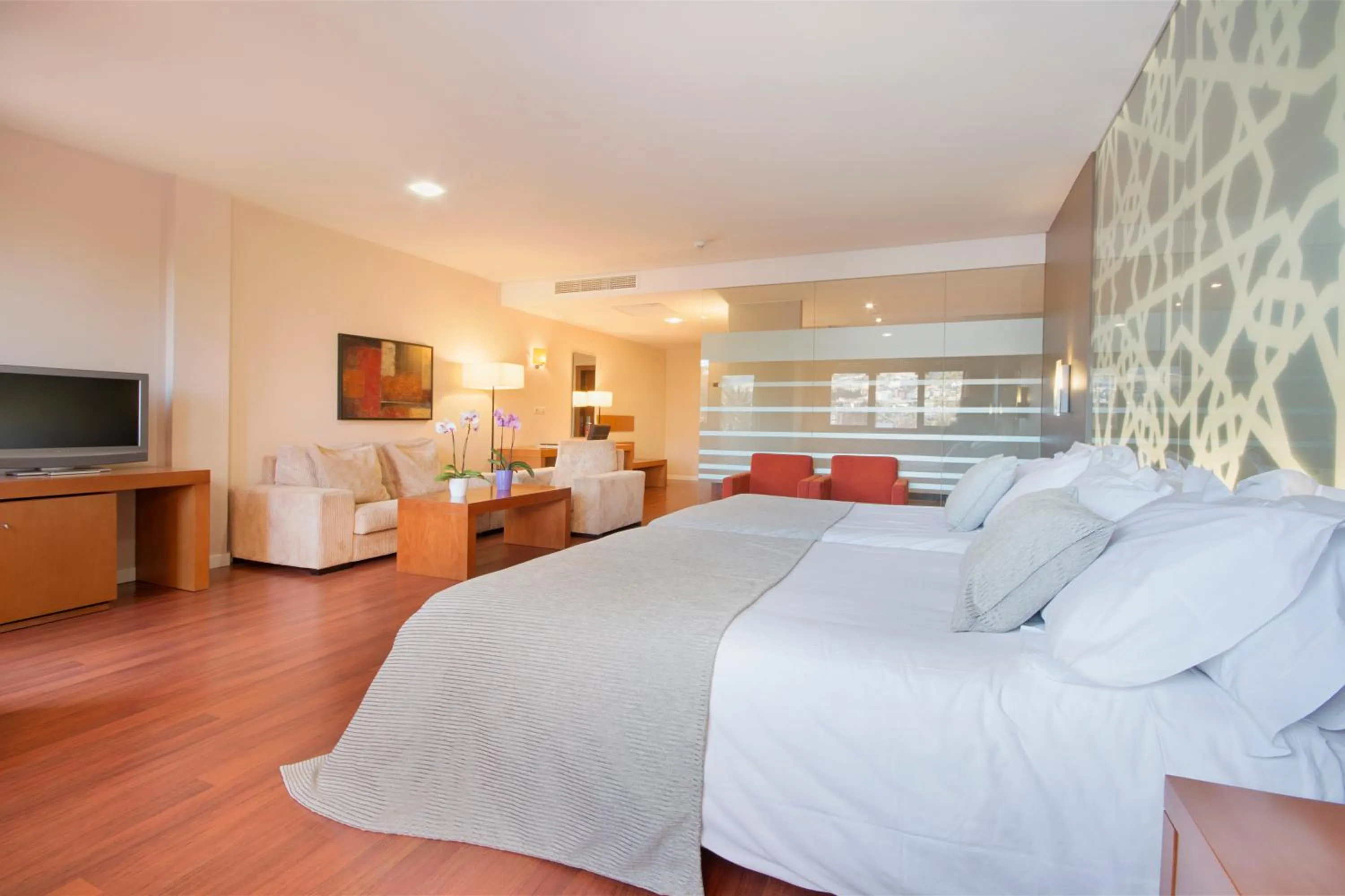 Bed in Hotel Granada Palace