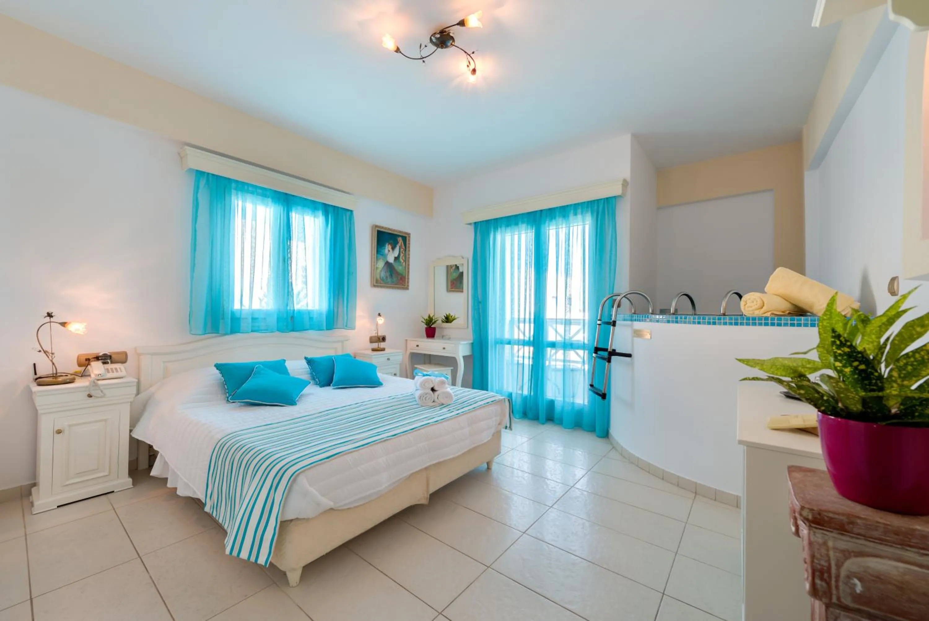 Photo of the whole room, Bed in Ellinon Thea Boutique Hotel