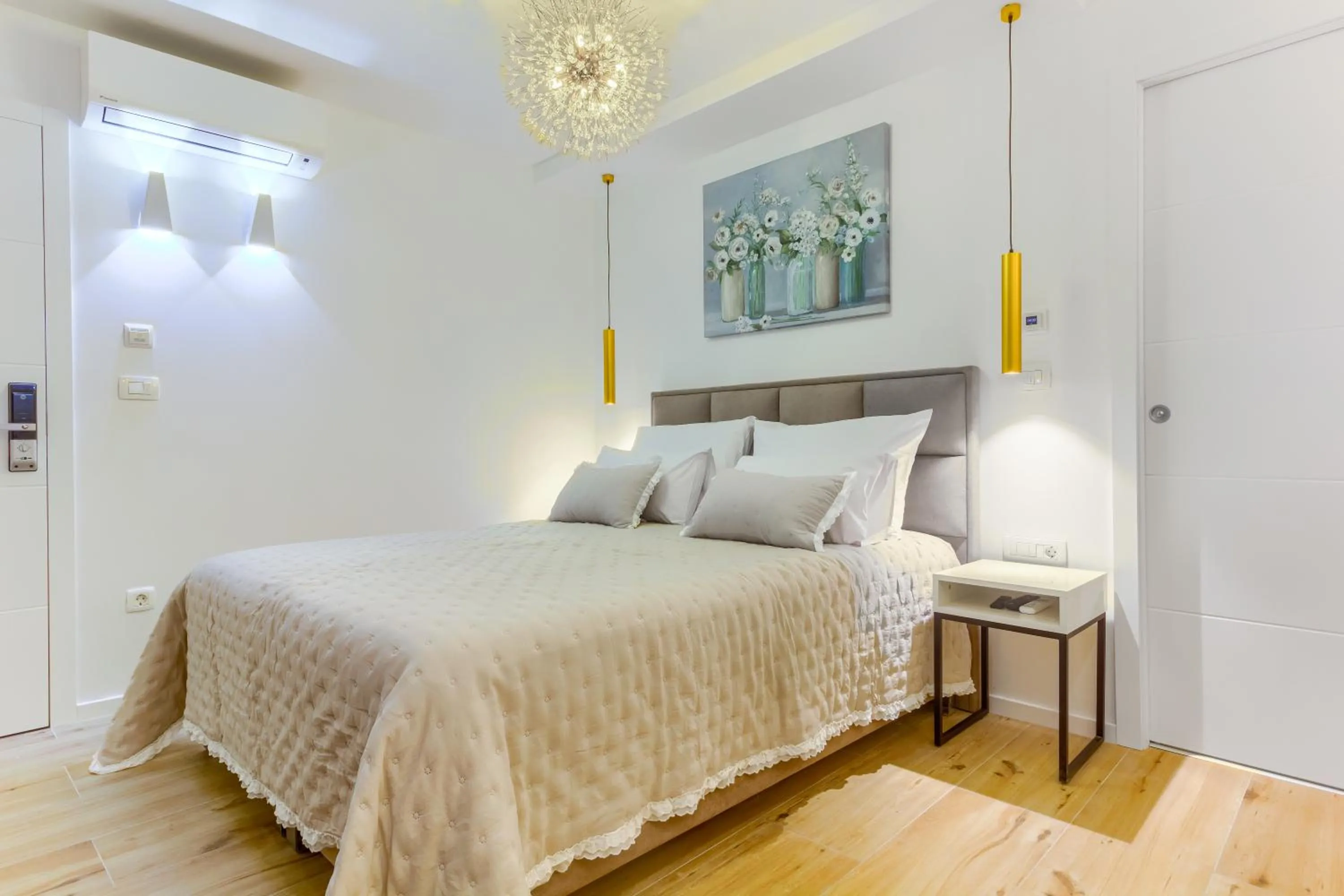 Bed in Irini Luxury Rooms