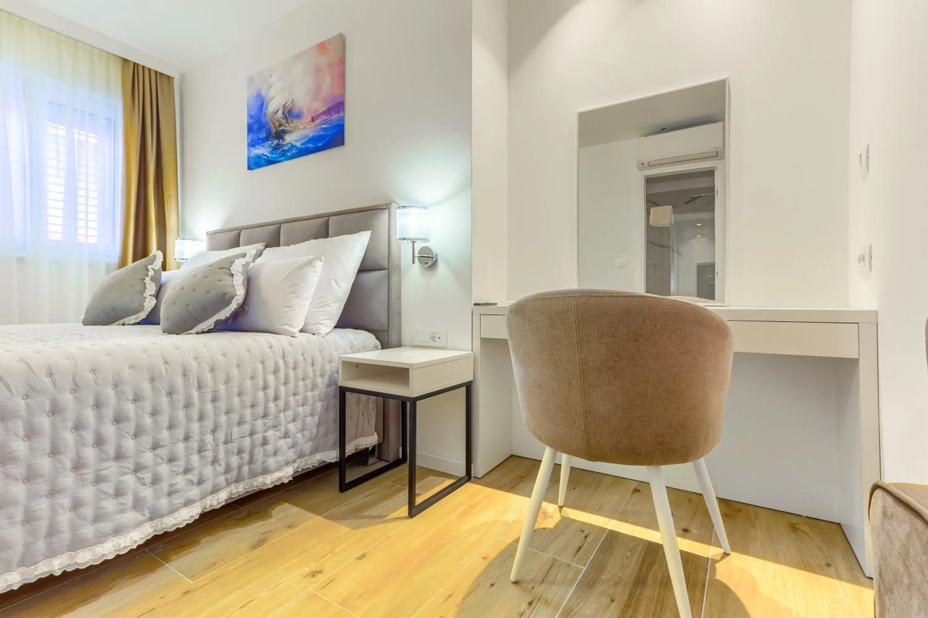 Bed in Irini Luxury Rooms