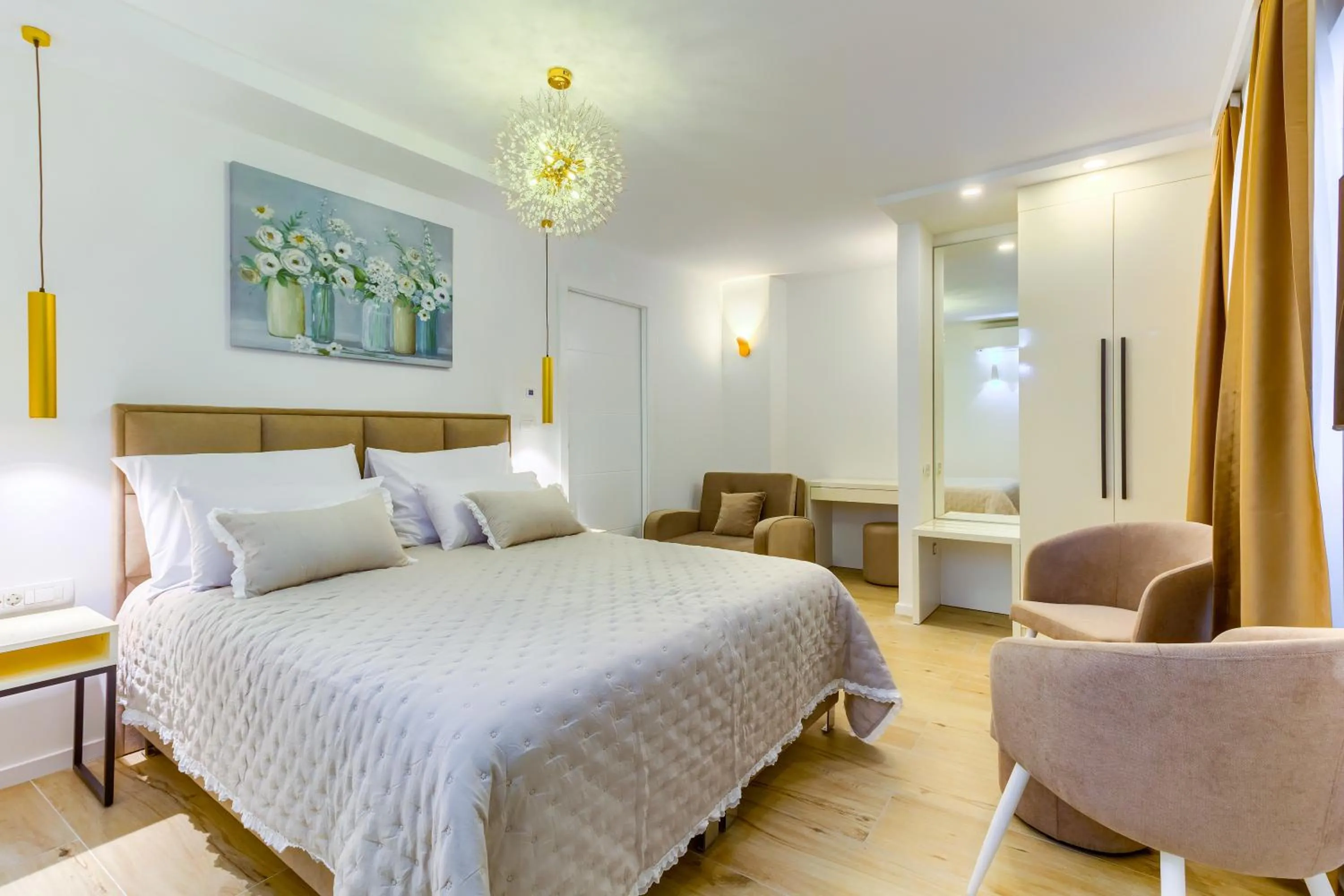 Bed in Irini Luxury Rooms