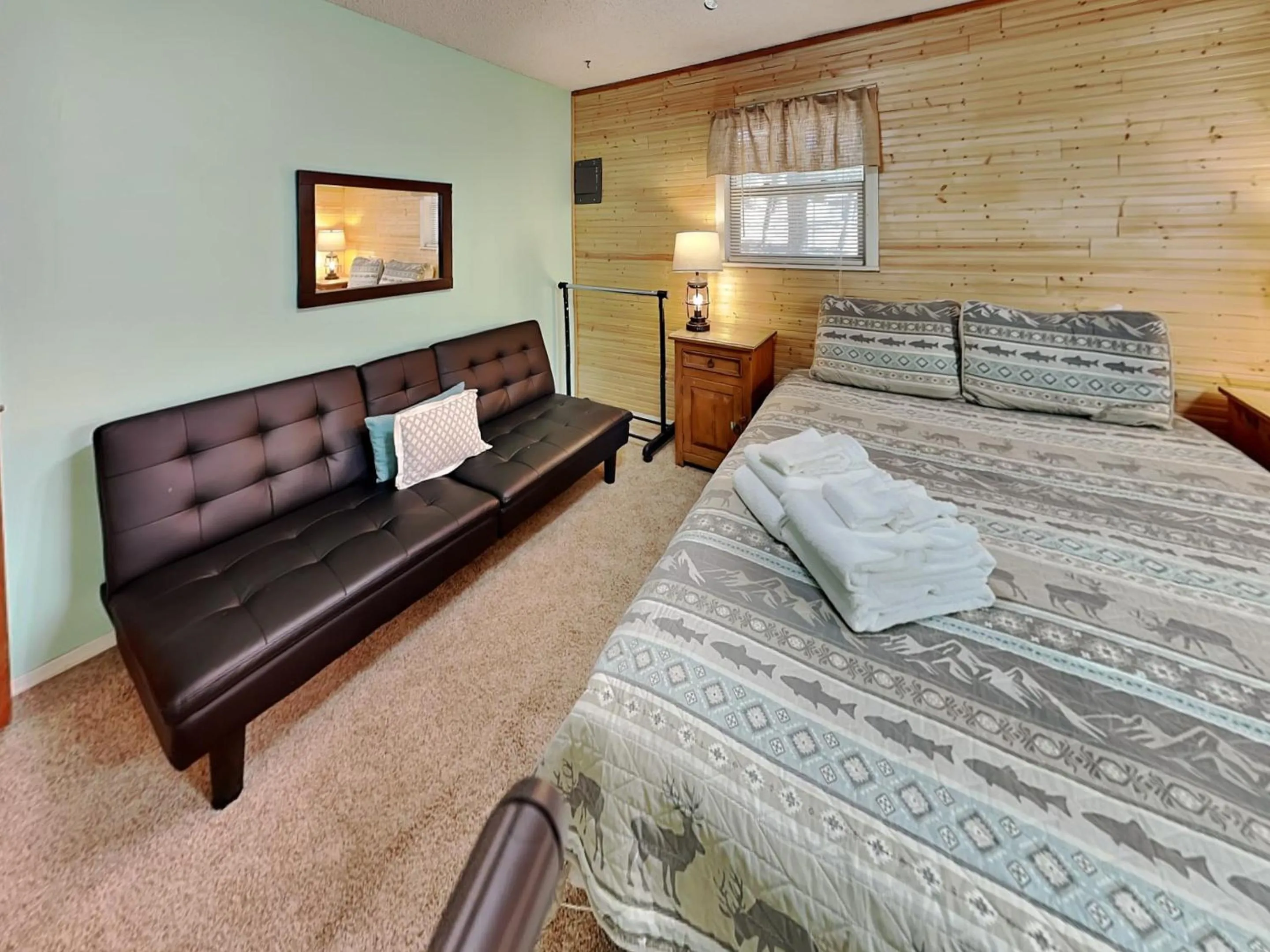 Bed in The Elk Meadow Cozy Cabin