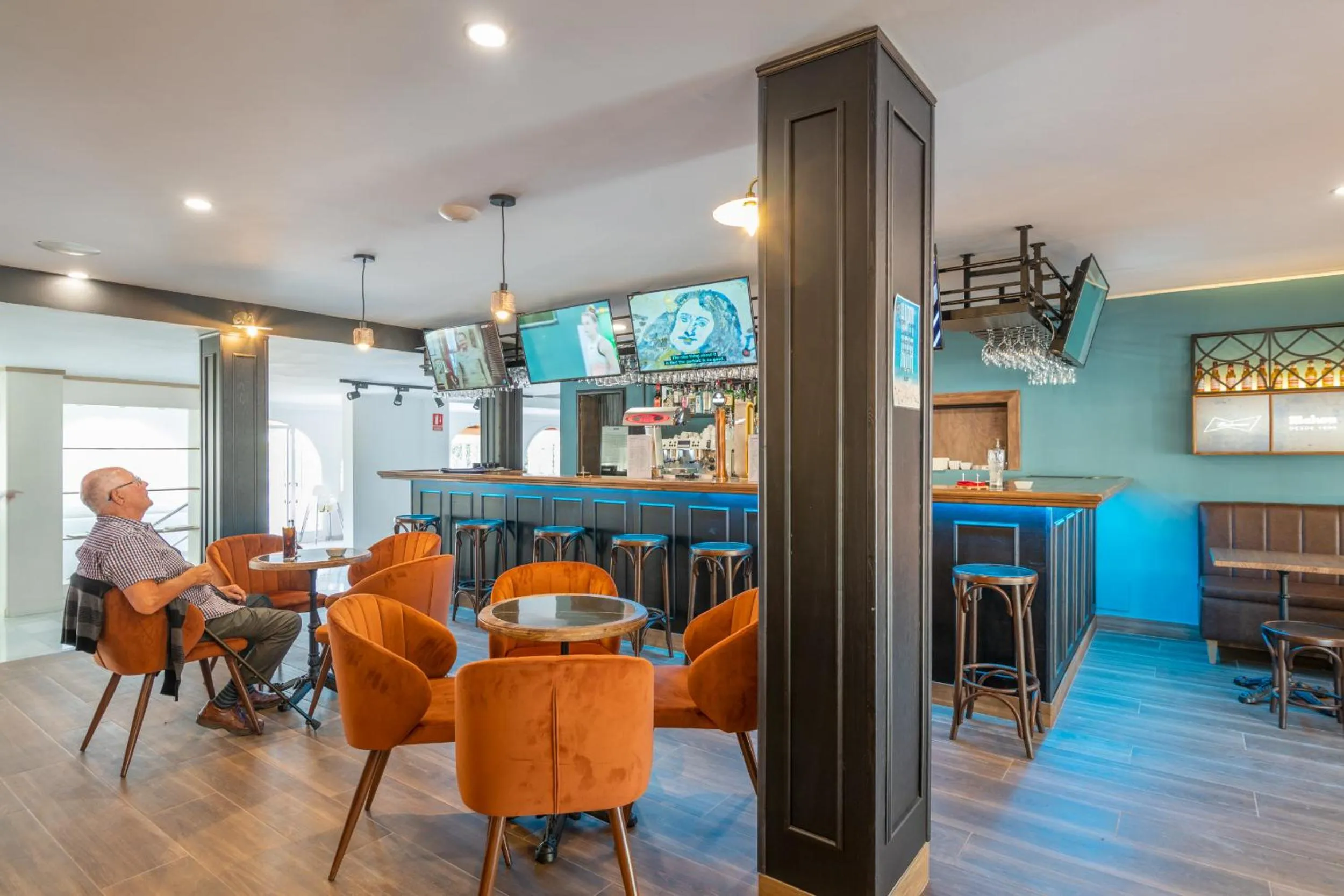 Communal lounge/ TV room in Hotel Nerja Club by Dorobe