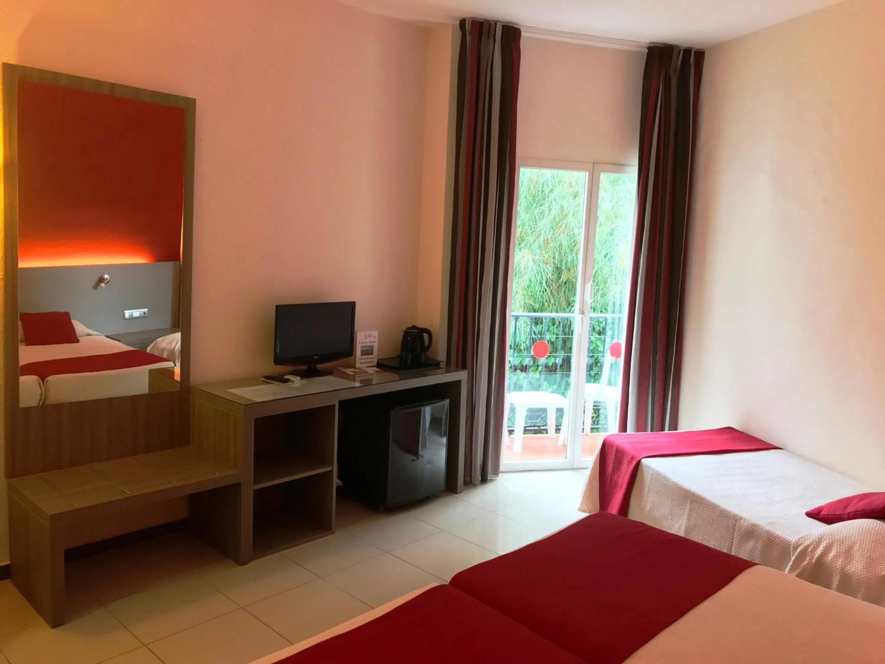 Photo of the whole room, Bed in Hotel Nerja Club by Dorobe