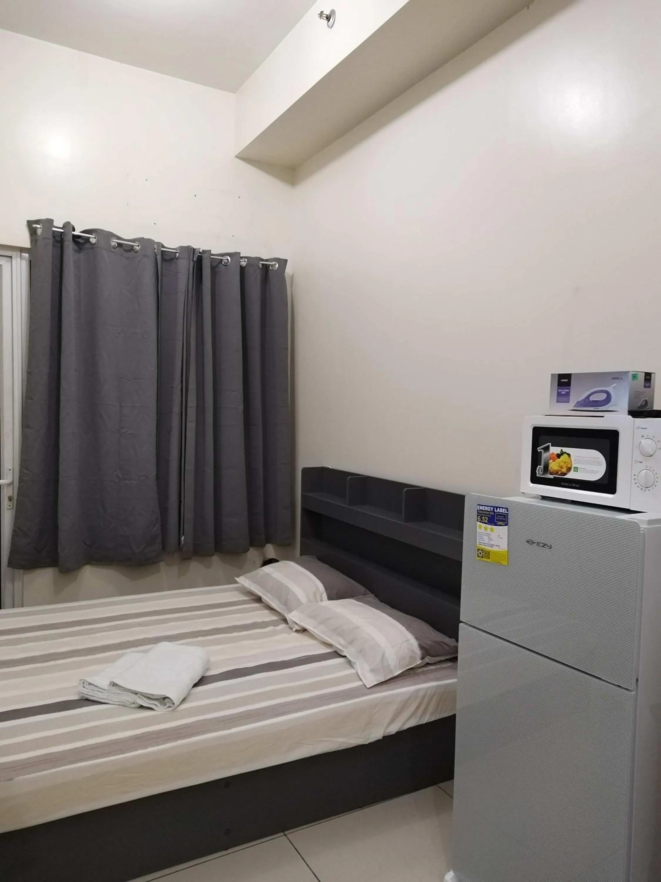 Bed in SMDC Breeze Residences