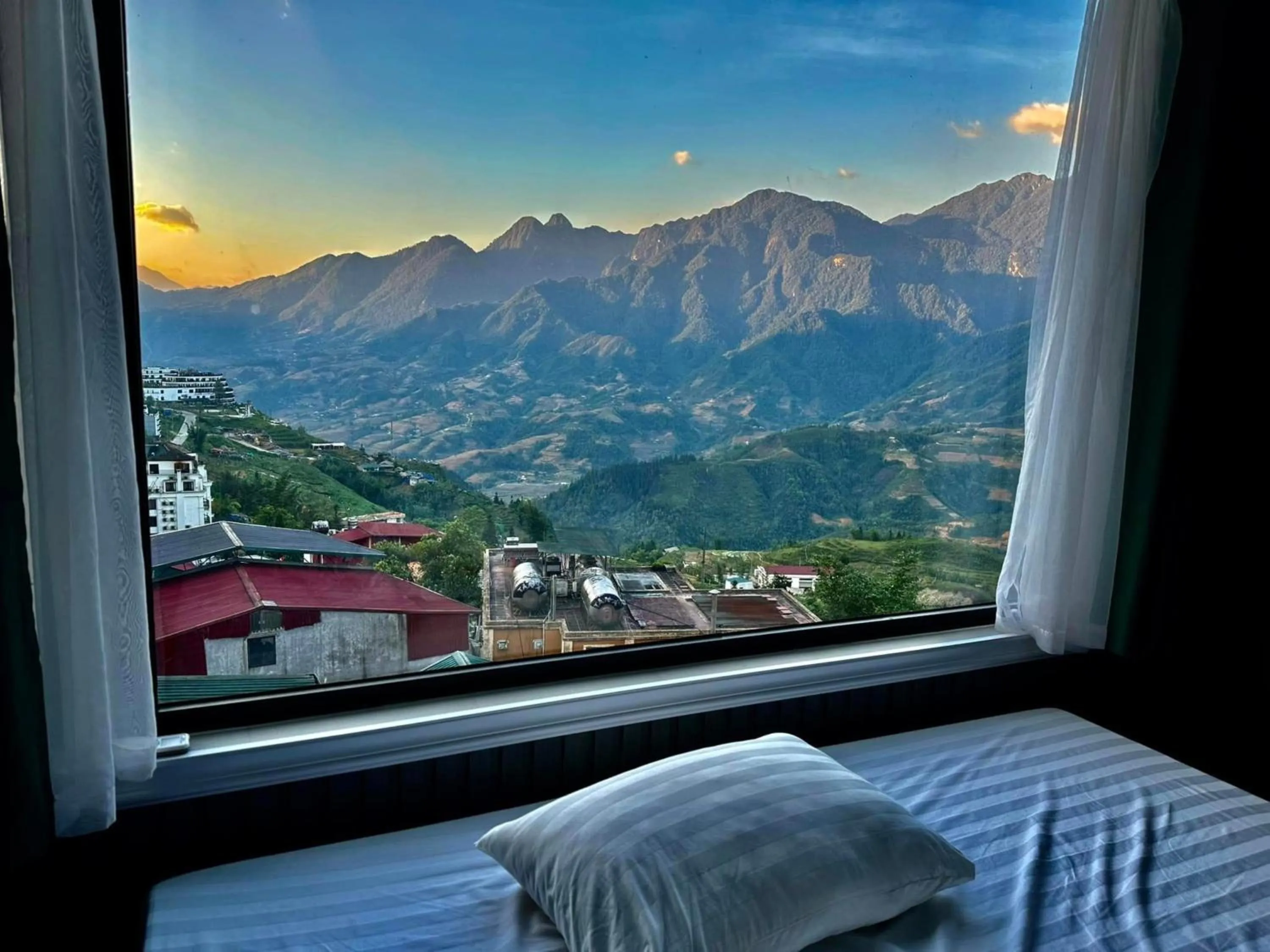 Photo of the whole room, Bed in Swan Sapa Hotel