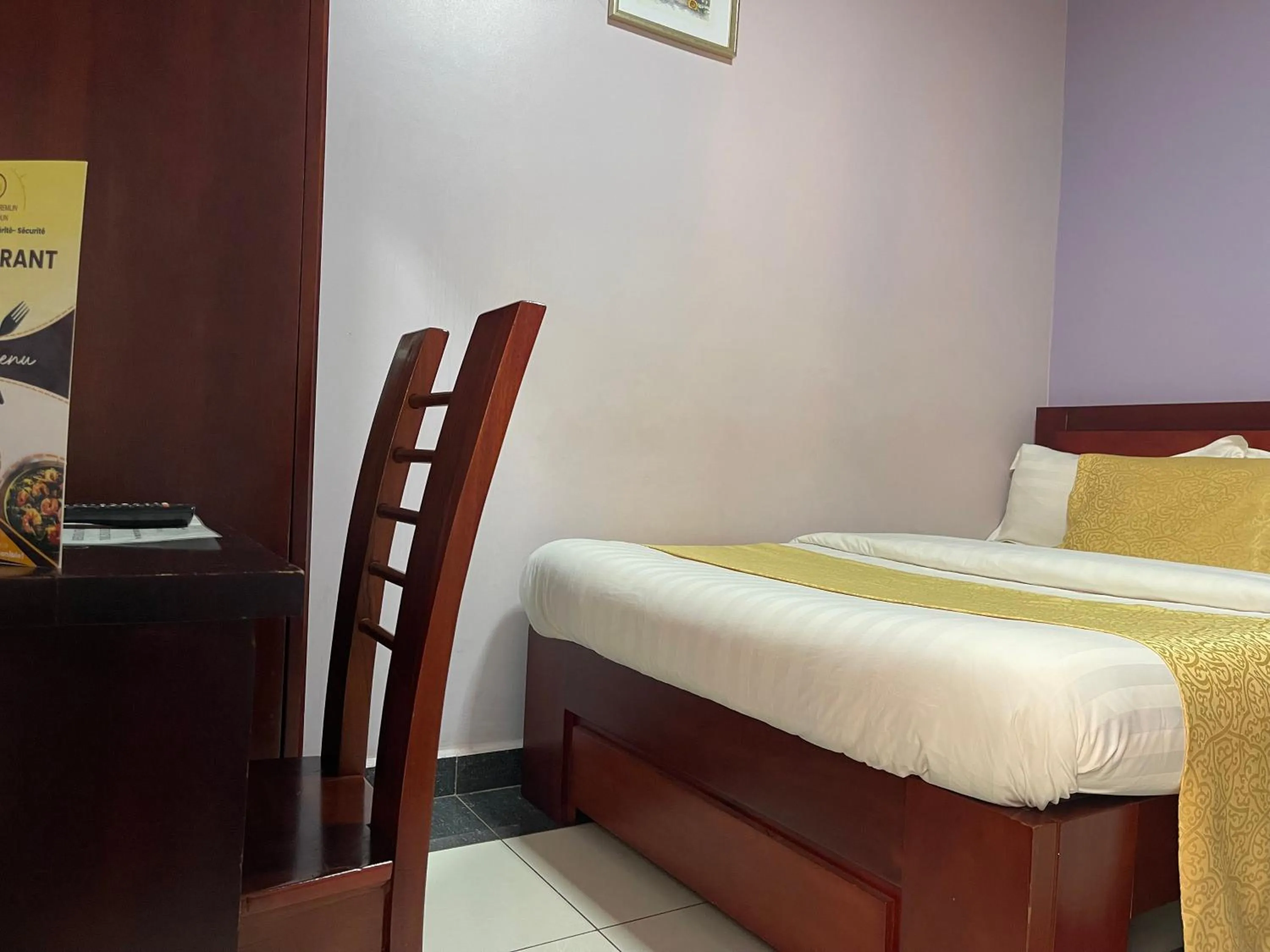 Bed in Hotel Le Kremlin Yaoundé