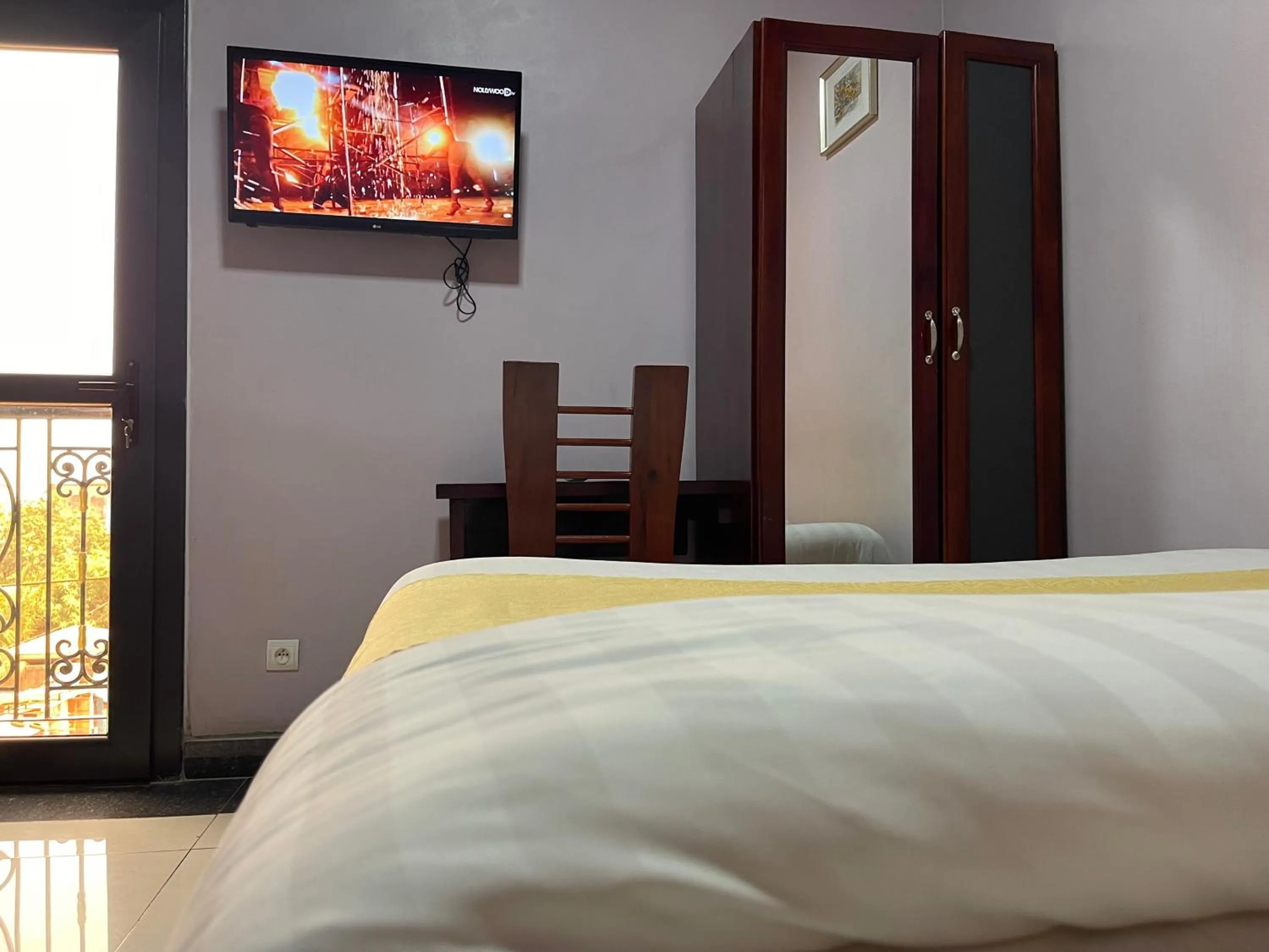 Bed in Hotel Le Kremlin Yaoundé