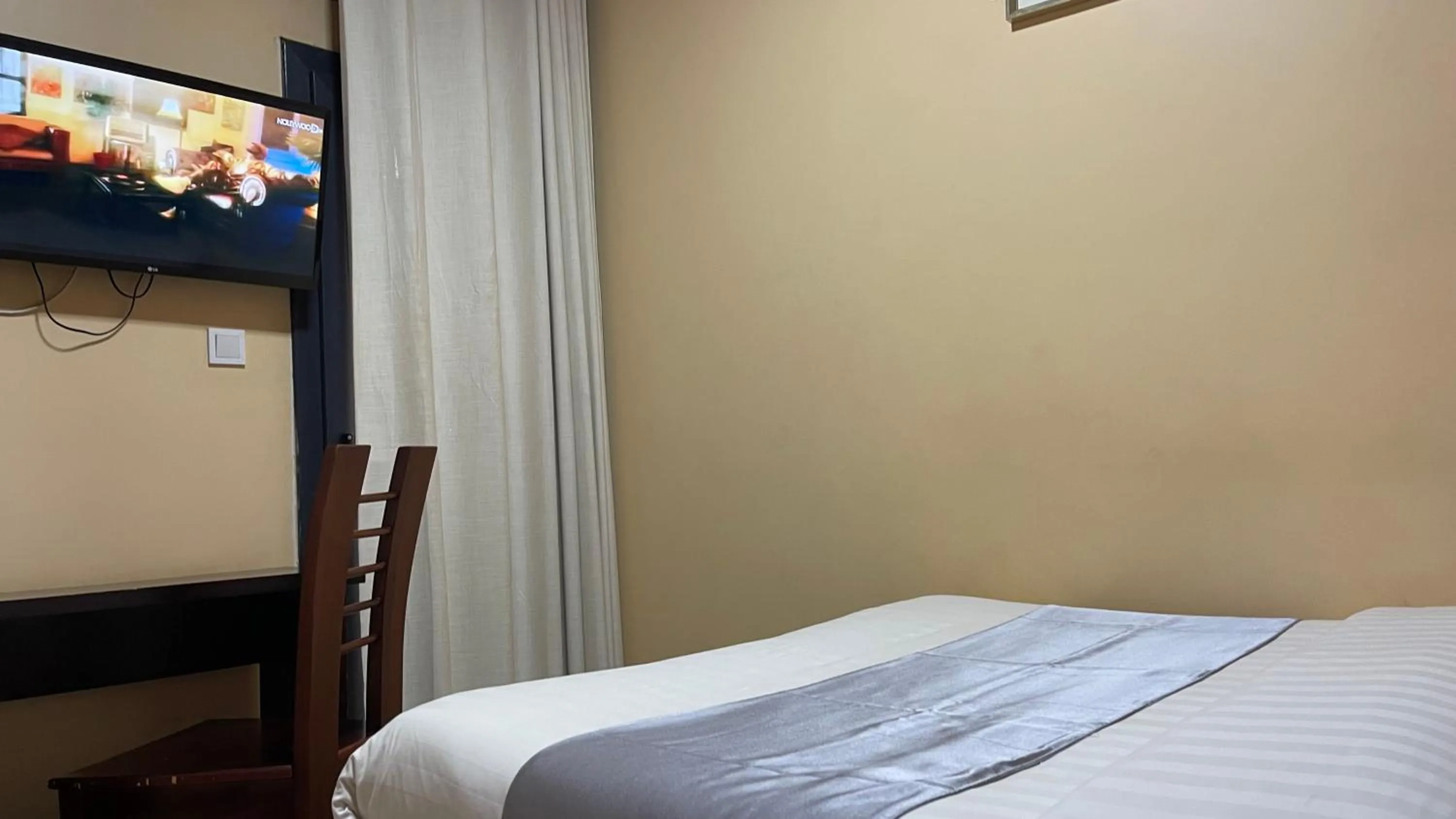 Bed in Hotel Le Kremlin Yaoundé