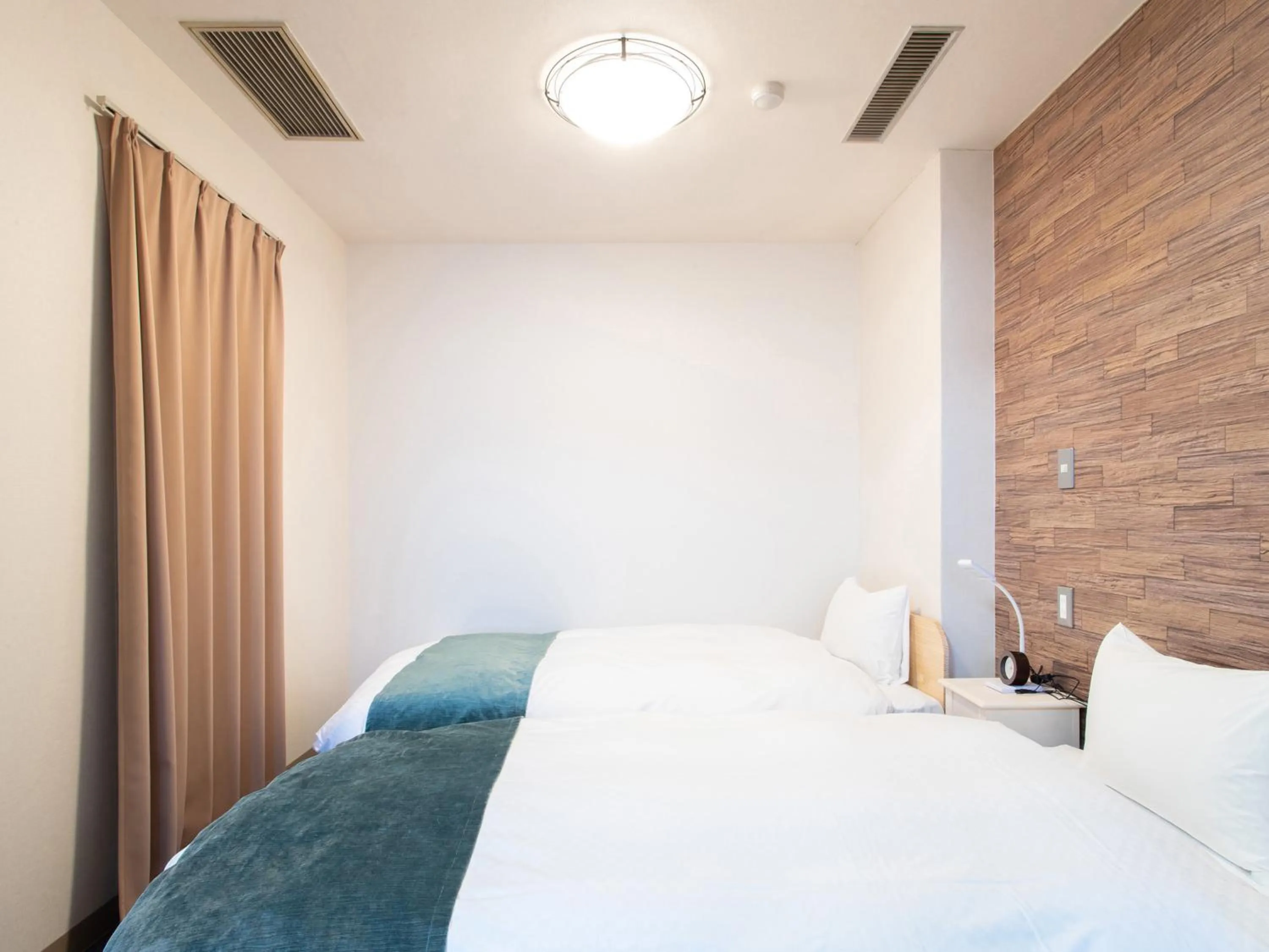 Photo of the whole room, Bed in Tabist Hotel Chouseikaku