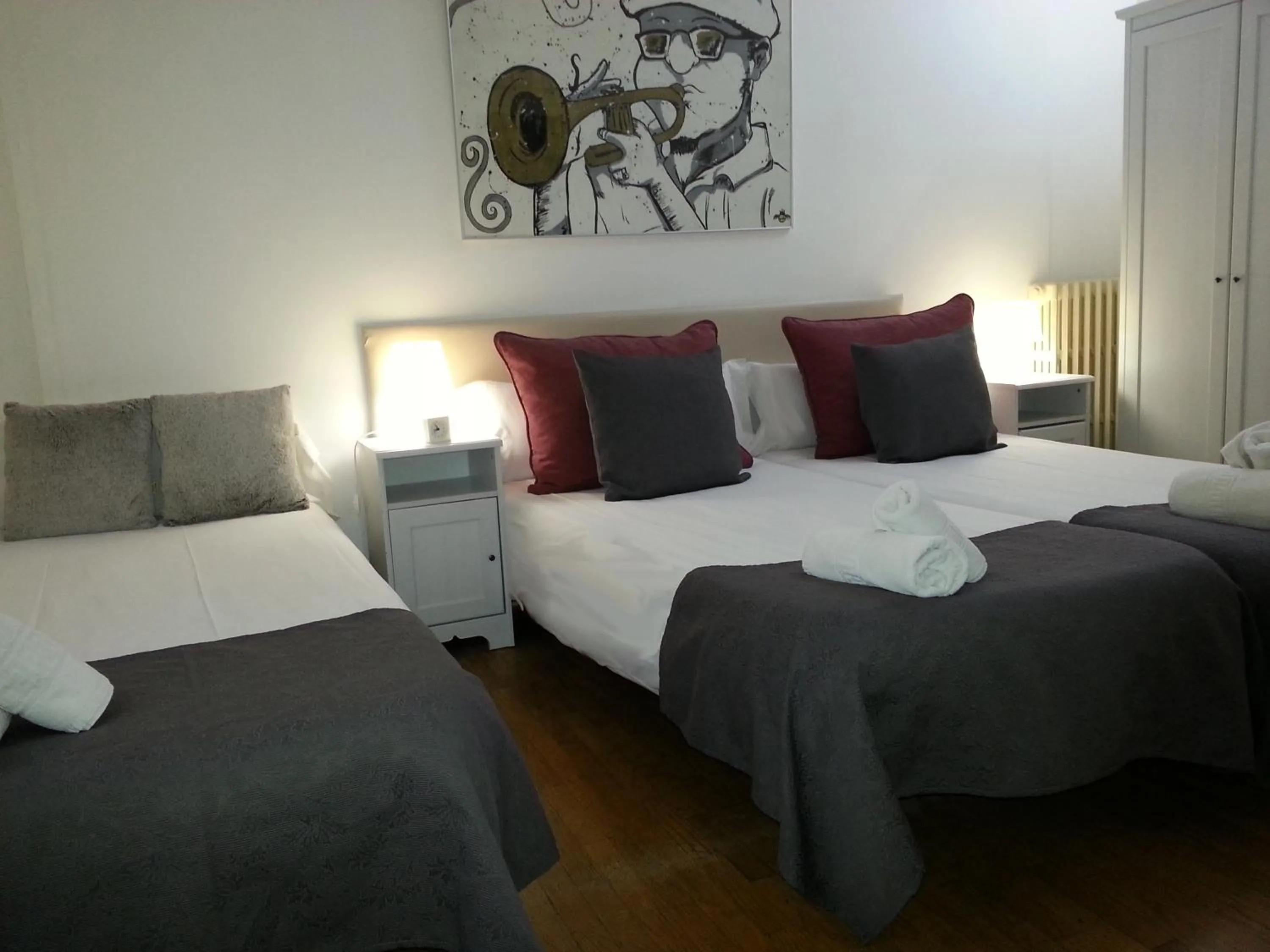 Photo of the whole room, Bed in Petit Hotel