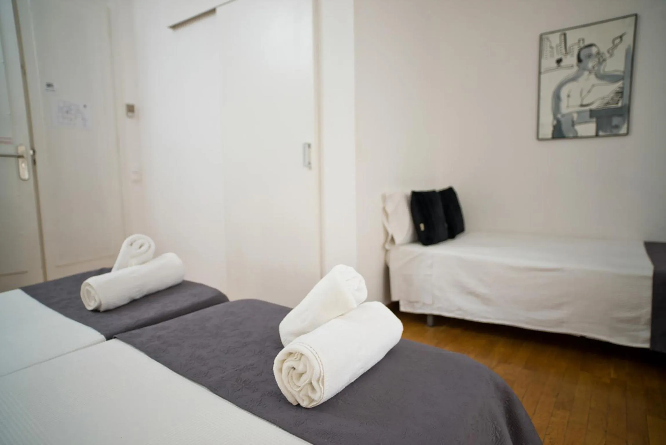 Photo of the whole room, Bed in Petit Hotel