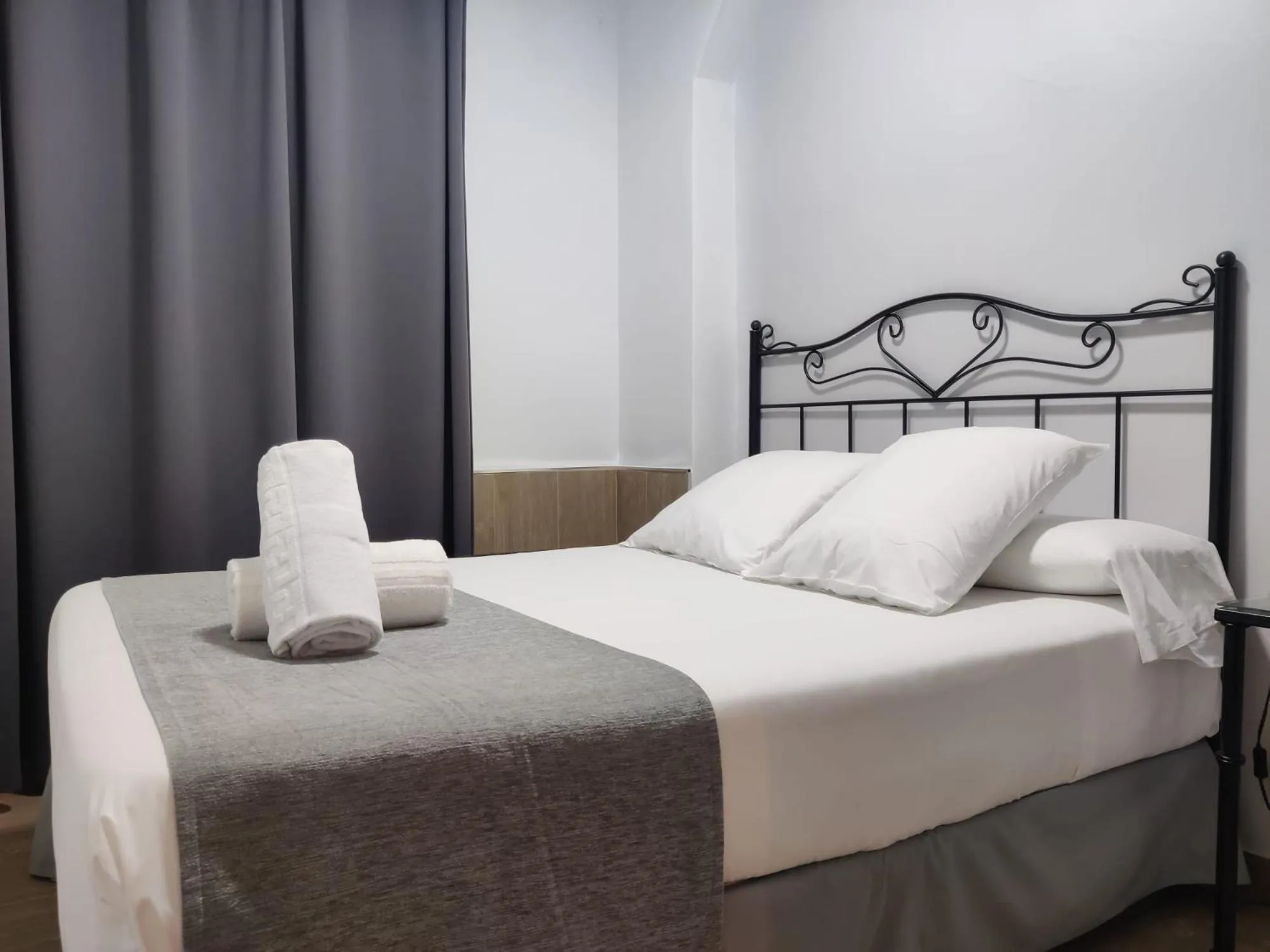 Bed in Hospedería Luis de Góngora