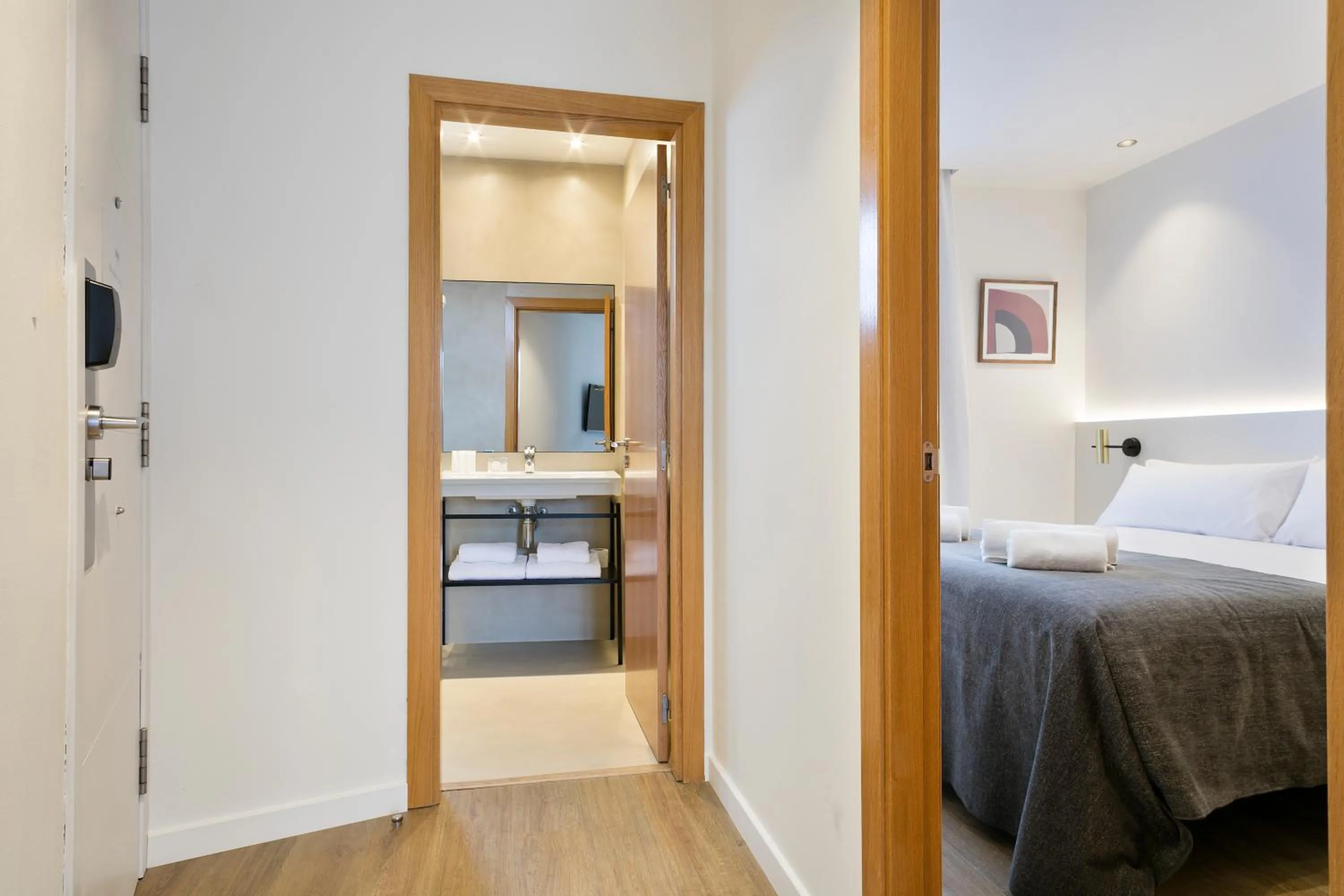 Toilet, Bed in Vale Suites