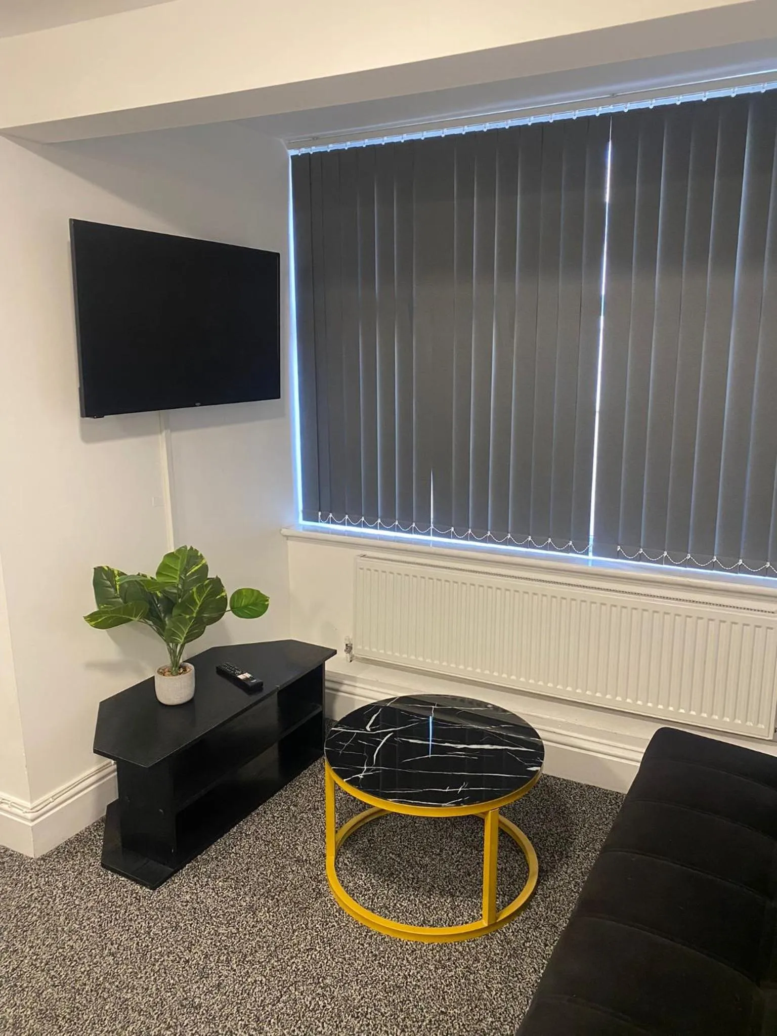 Living room in Black Ocean Holiday Apartments