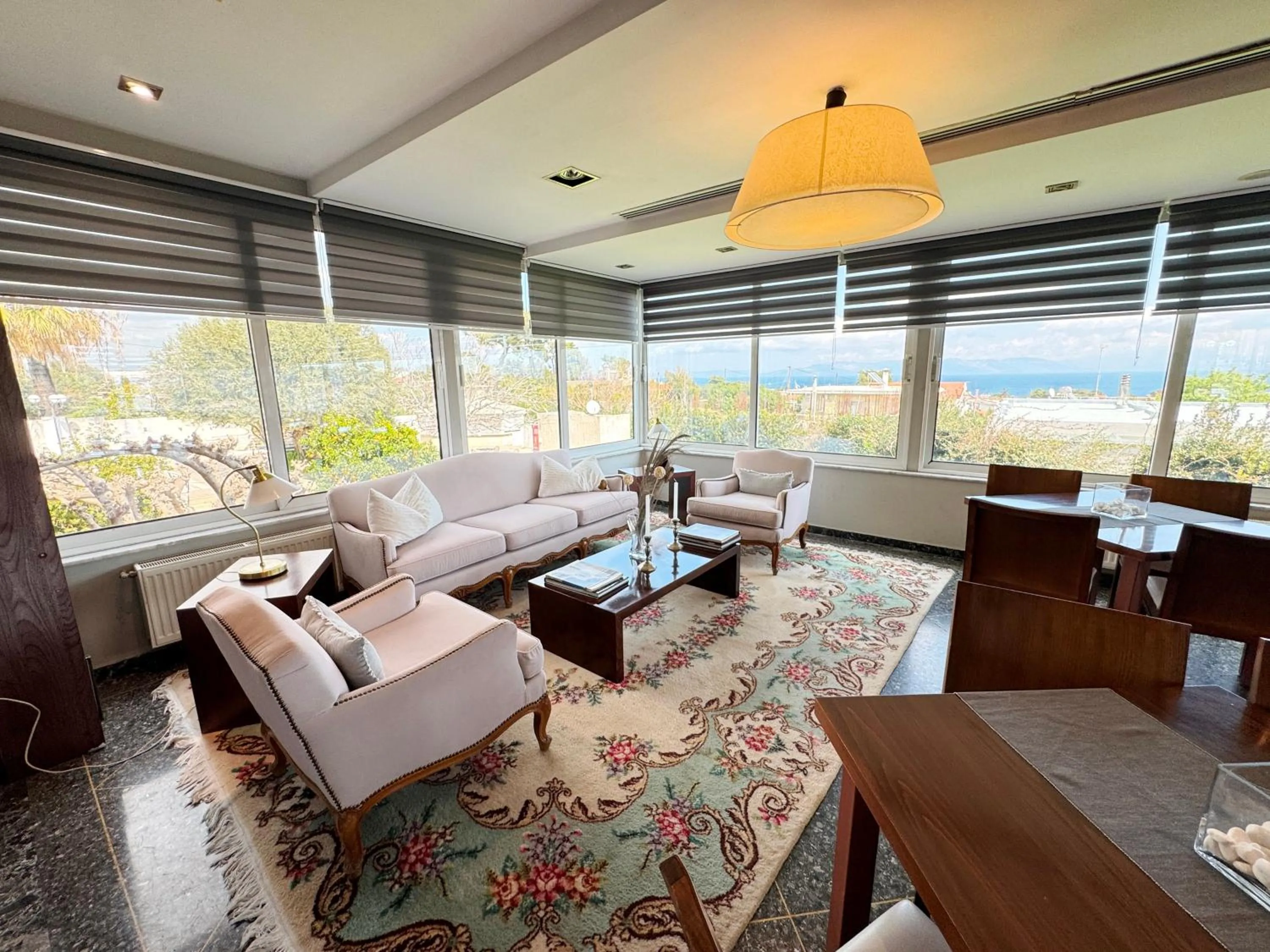 Communal lounge/ TV room in Myrto Hotel