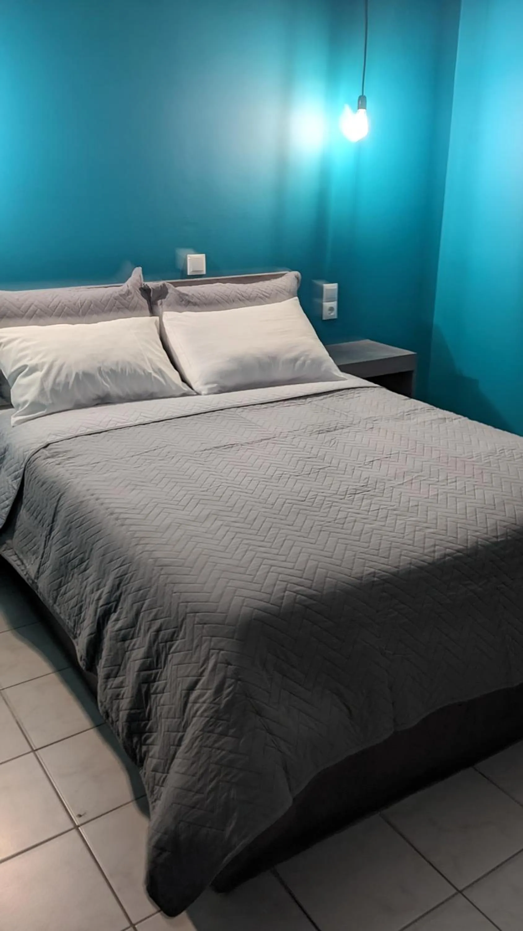 Bed in Hotel Theoxenia