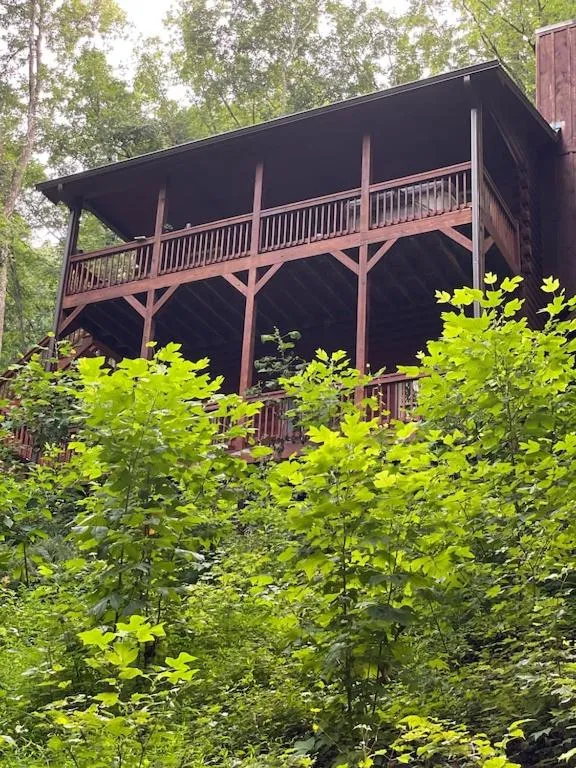 Property building in Alpenhaus Cabins Real Log Home in Helen Ga Mountains with hot tub and balconies