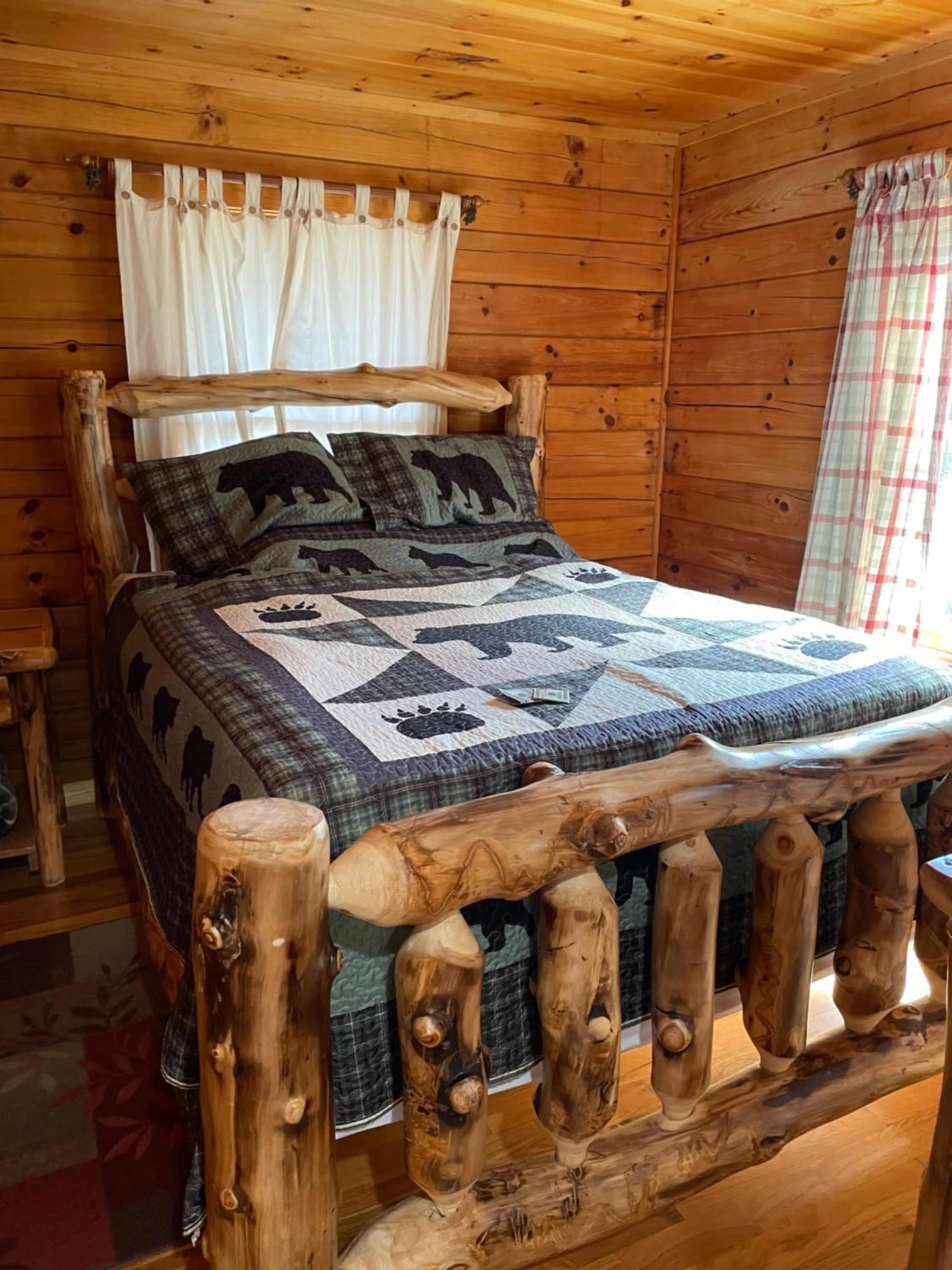 Bed in Alpenhaus Cabins Real Log Home in Helen Ga Mountains with hot tub and balconies