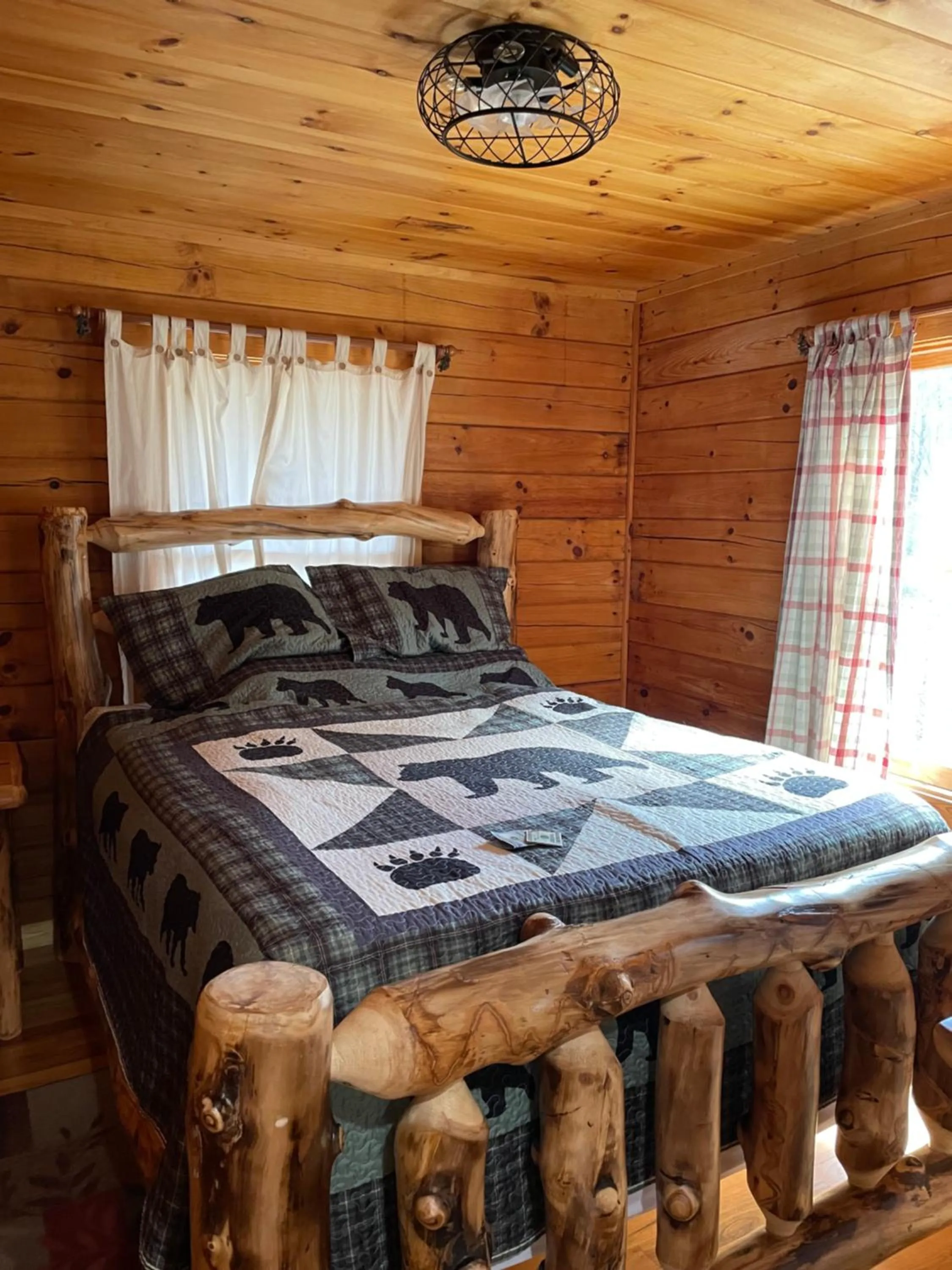 Bed in Alpenhaus Cabins Real Log Home in Helen Ga Mountains with hot tub and balconies