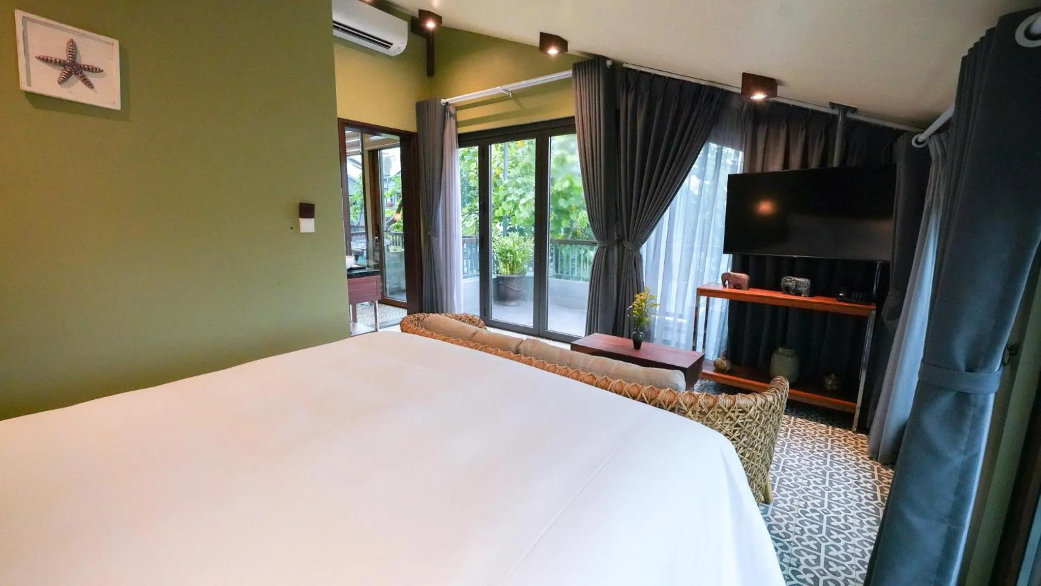 Photo of the whole room, Bed in CHiEM HoiAn - The Beachside Boutique Hotel & Villa