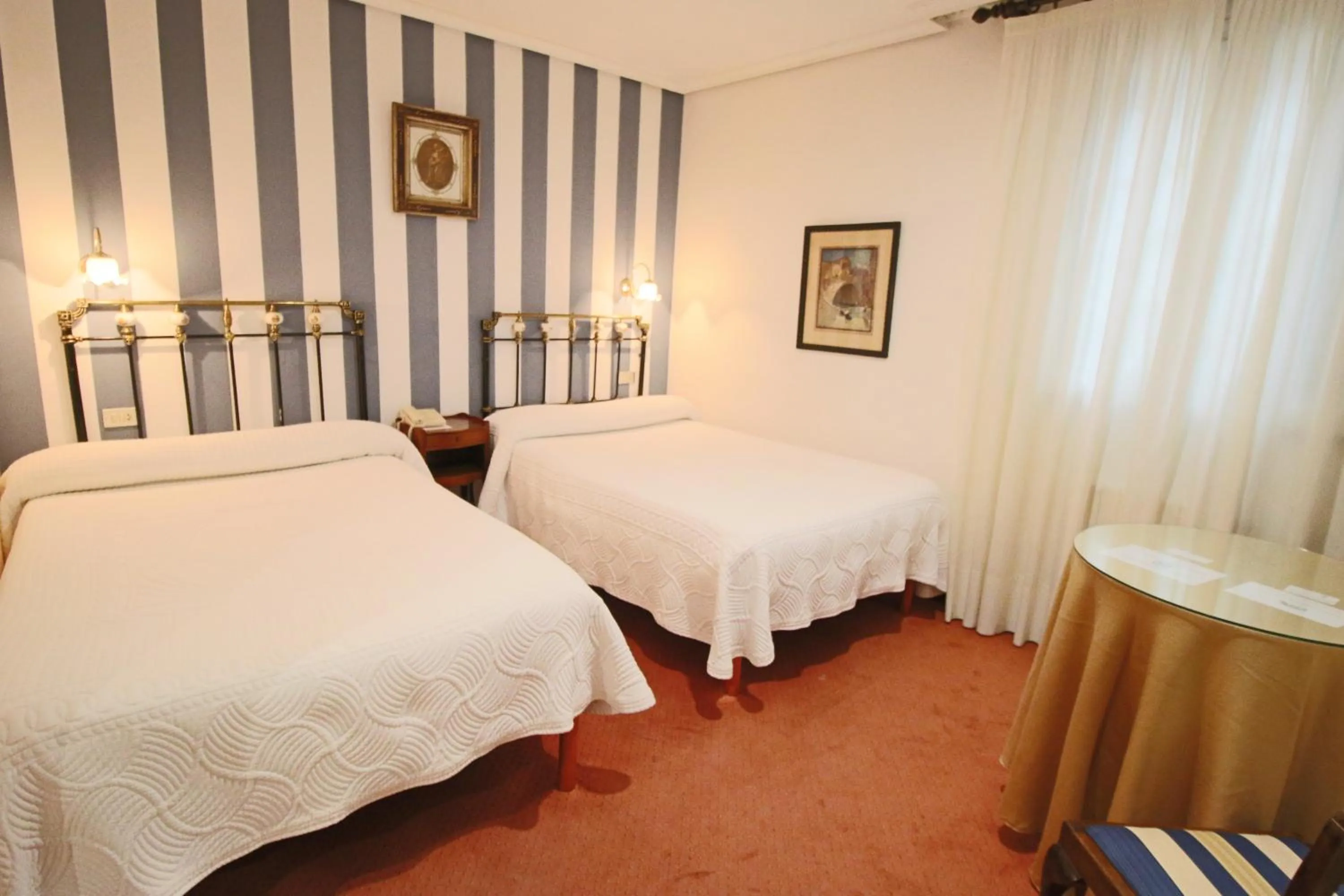 Bed in Hotel Santillana