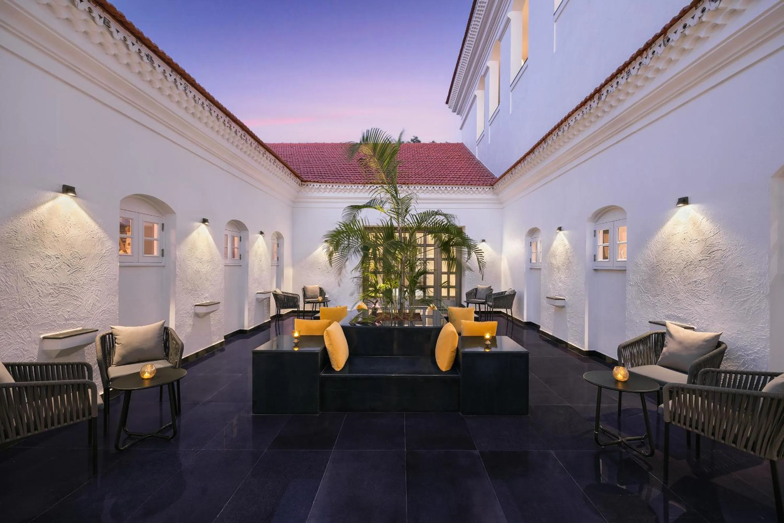 Inner courtyard view in The Yellow House, Goa - IHCL SeleQtions